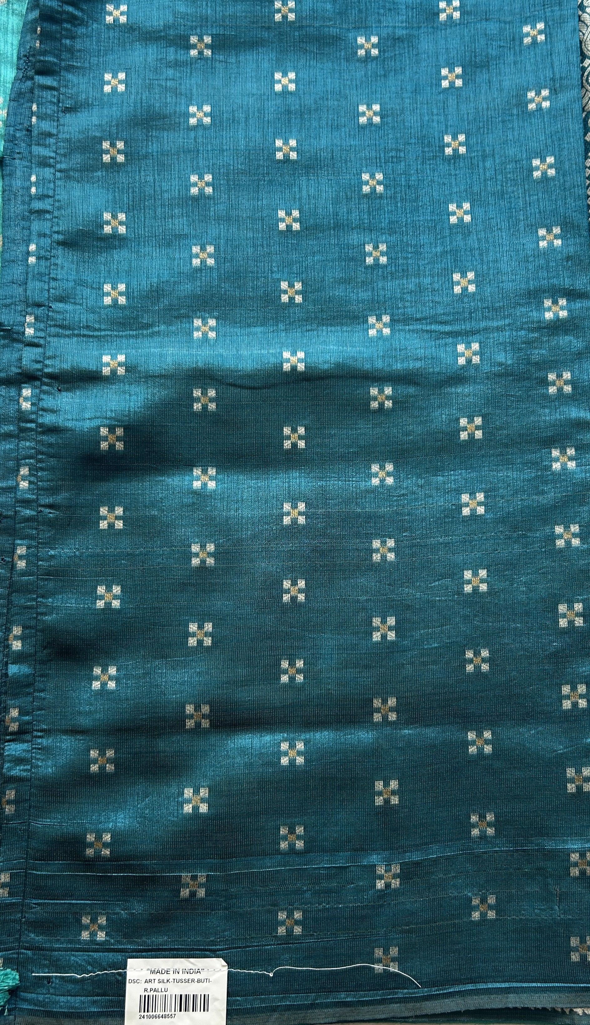 Semi Raw Silk Saree Turquoise Colored Elegantly Paired with a Zari Border. - Sampradaya Designer Studio