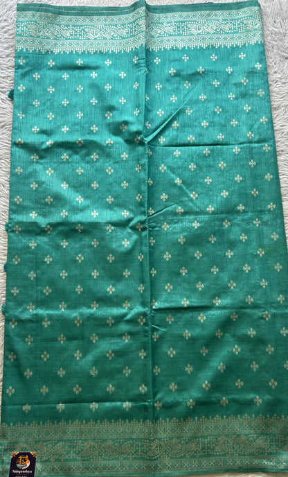 Semi Raw Silk Saree Turquoise Colored Elegantly Paired with a Zari Border. - Sampradaya Designer Studio