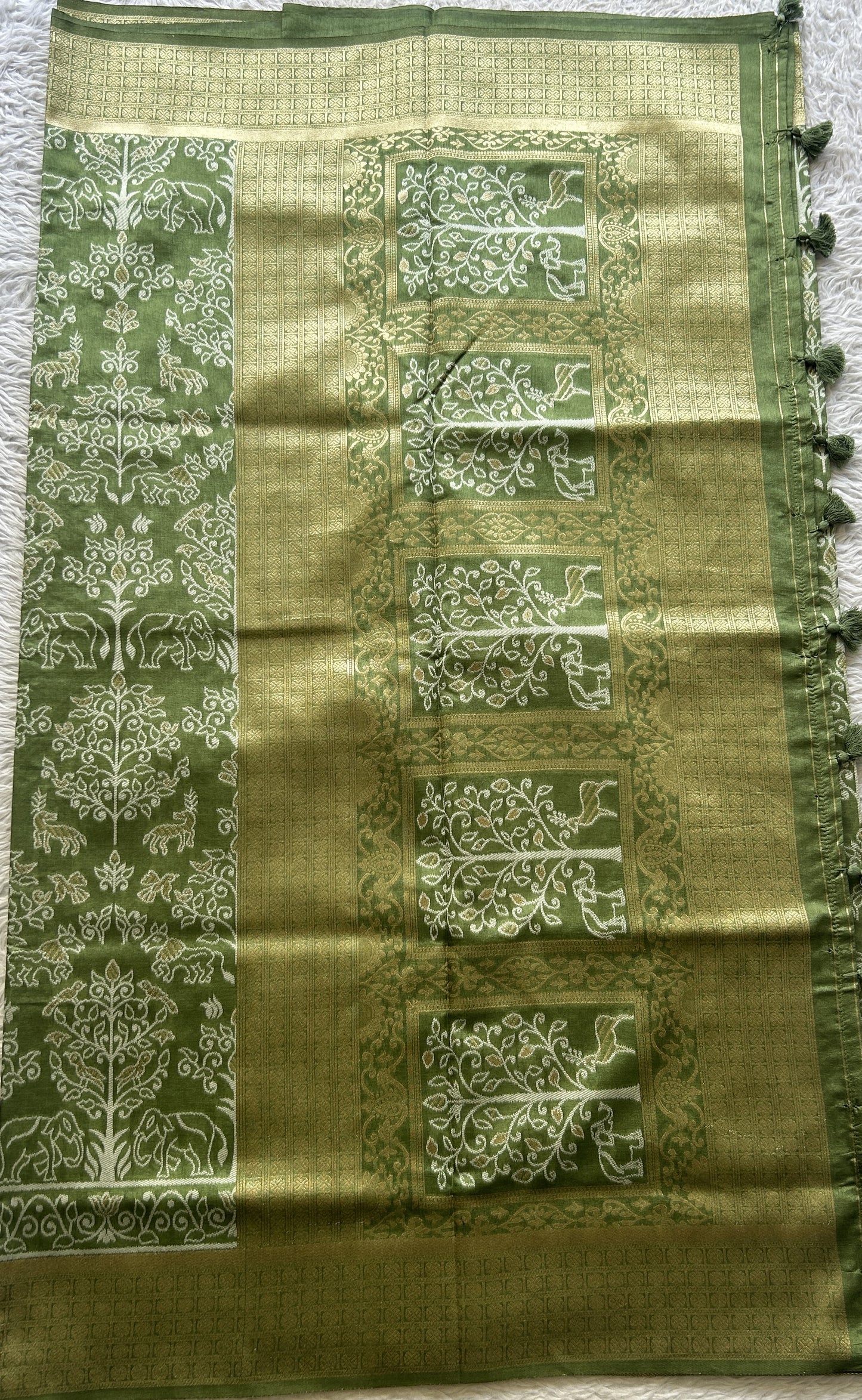 Semi Raw Silk Allover Saree Green Colored Elegantly Paired with a Zari Border. - Sampradaya Designer Studio
