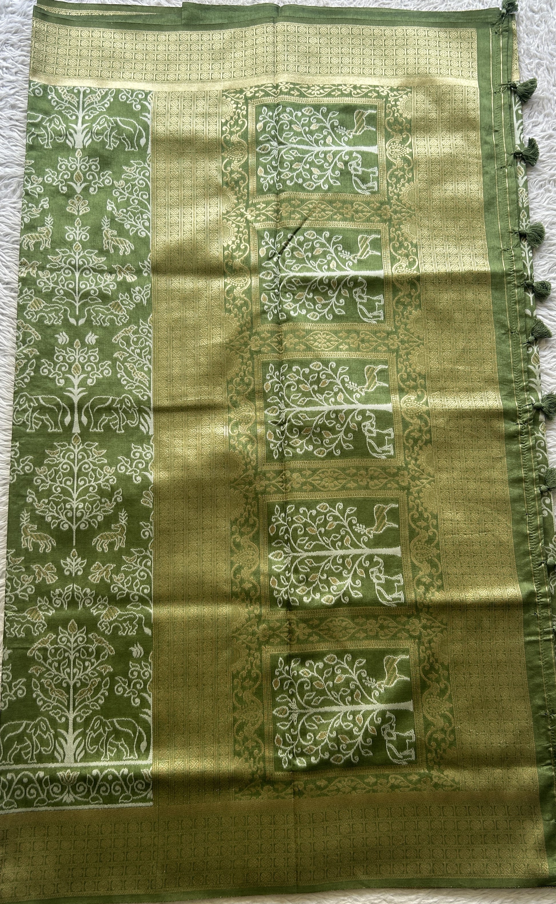 Semi Raw Silk Allover Saree Green Colored Elegantly Paired with a Zari Border. - Sampradaya Designer Studio