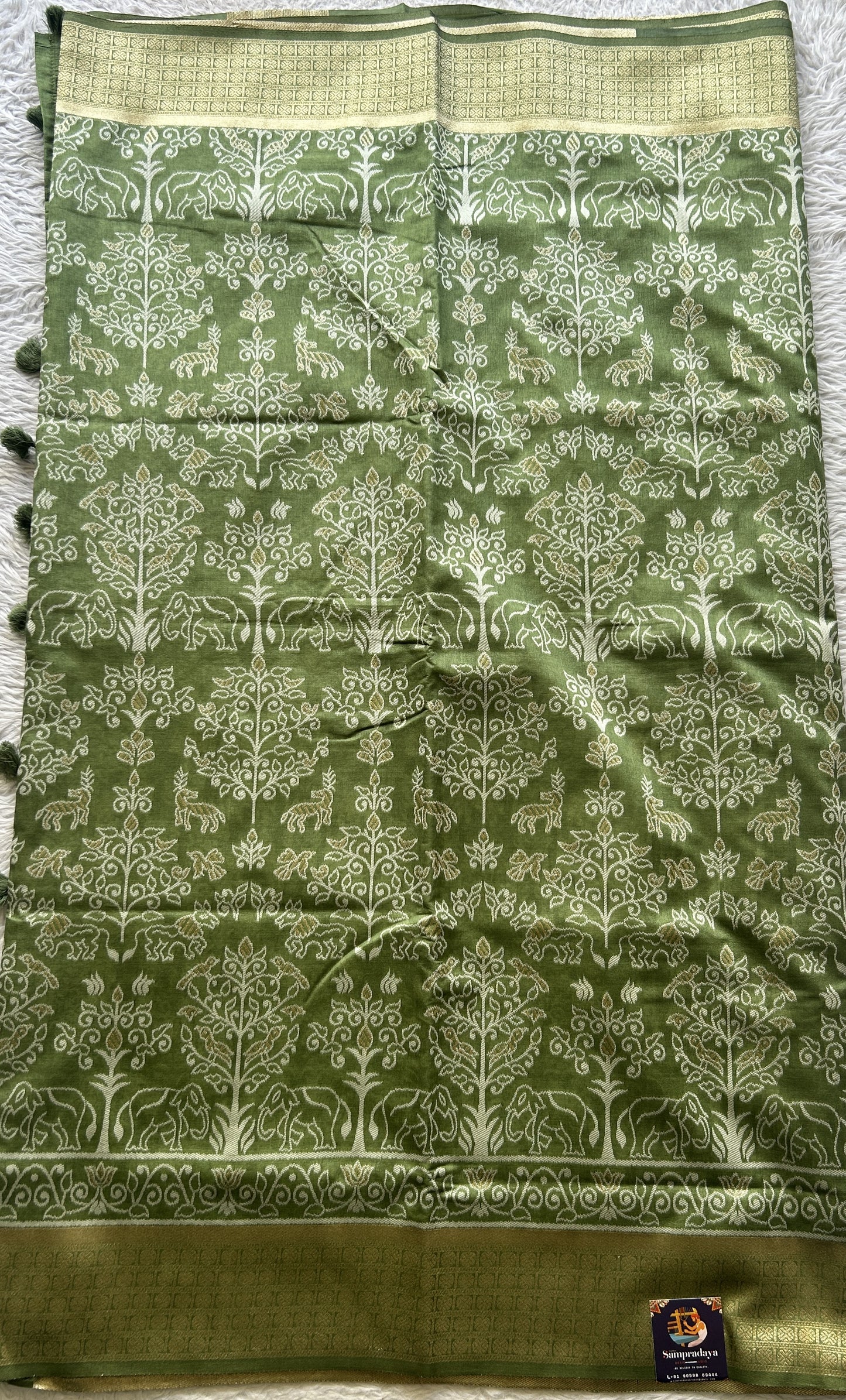 Semi Raw Silk Allover Saree Green Colored Elegantly Paired with a Zari Border. - Sampradaya Designer Studio