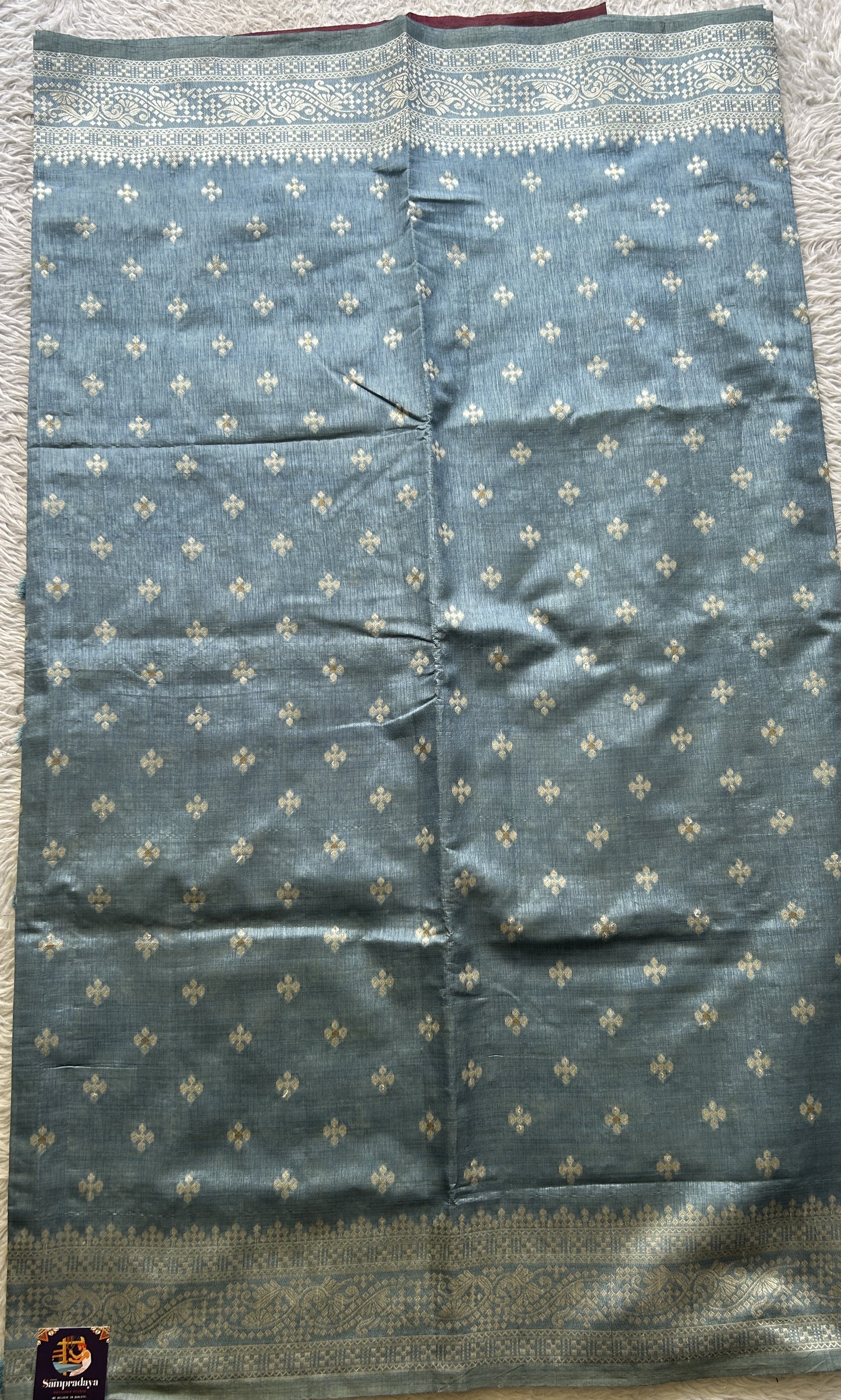 Semi Raw Silk Saree Baby Blue Colored Elegantly Paired with a Zari Border. - Sampradaya Designer Studio
