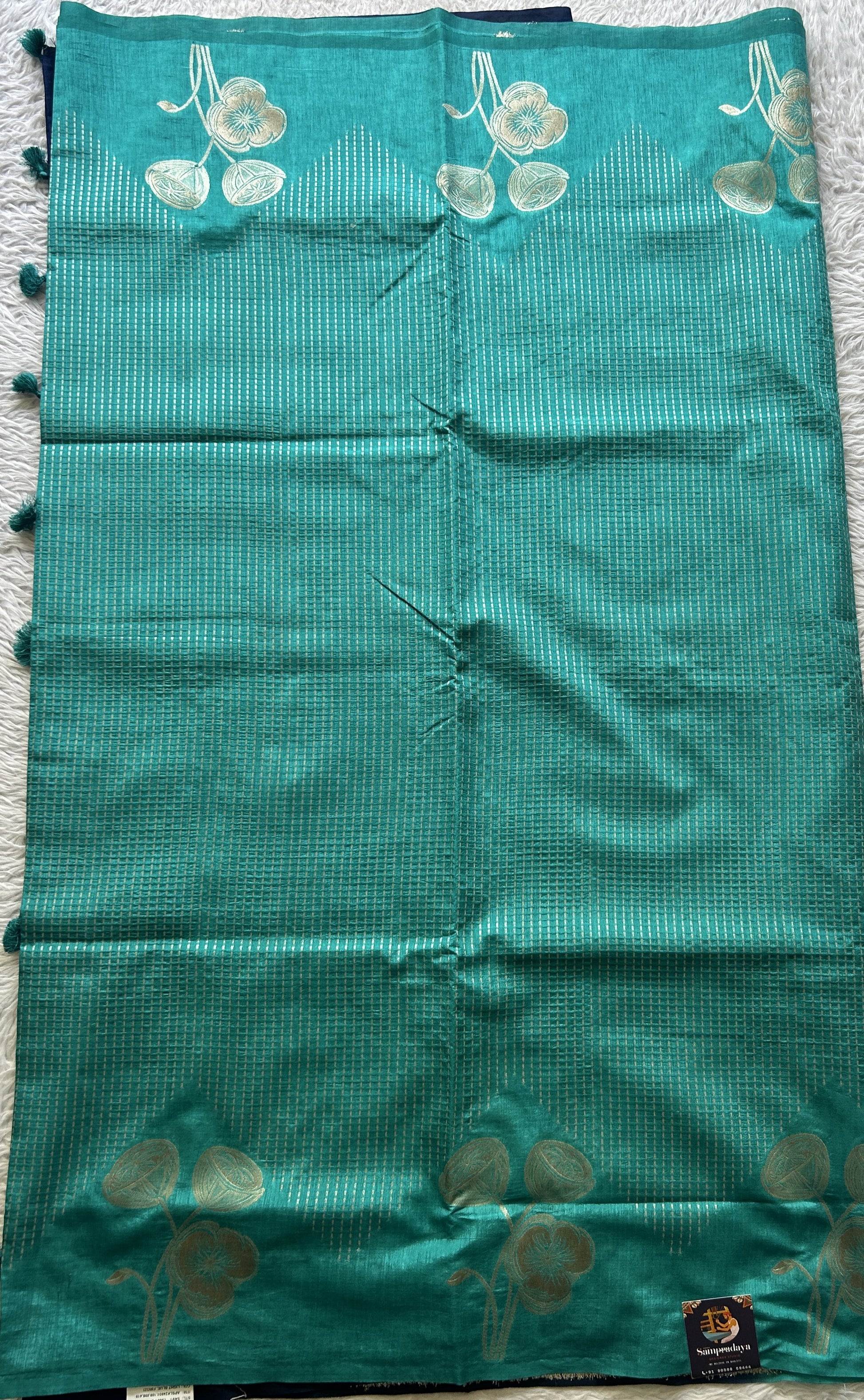 Semi Raw Silk Saree Sea Blue Colored Elegantly Paired with a Zari Border. - Sampradaya Designer Studio