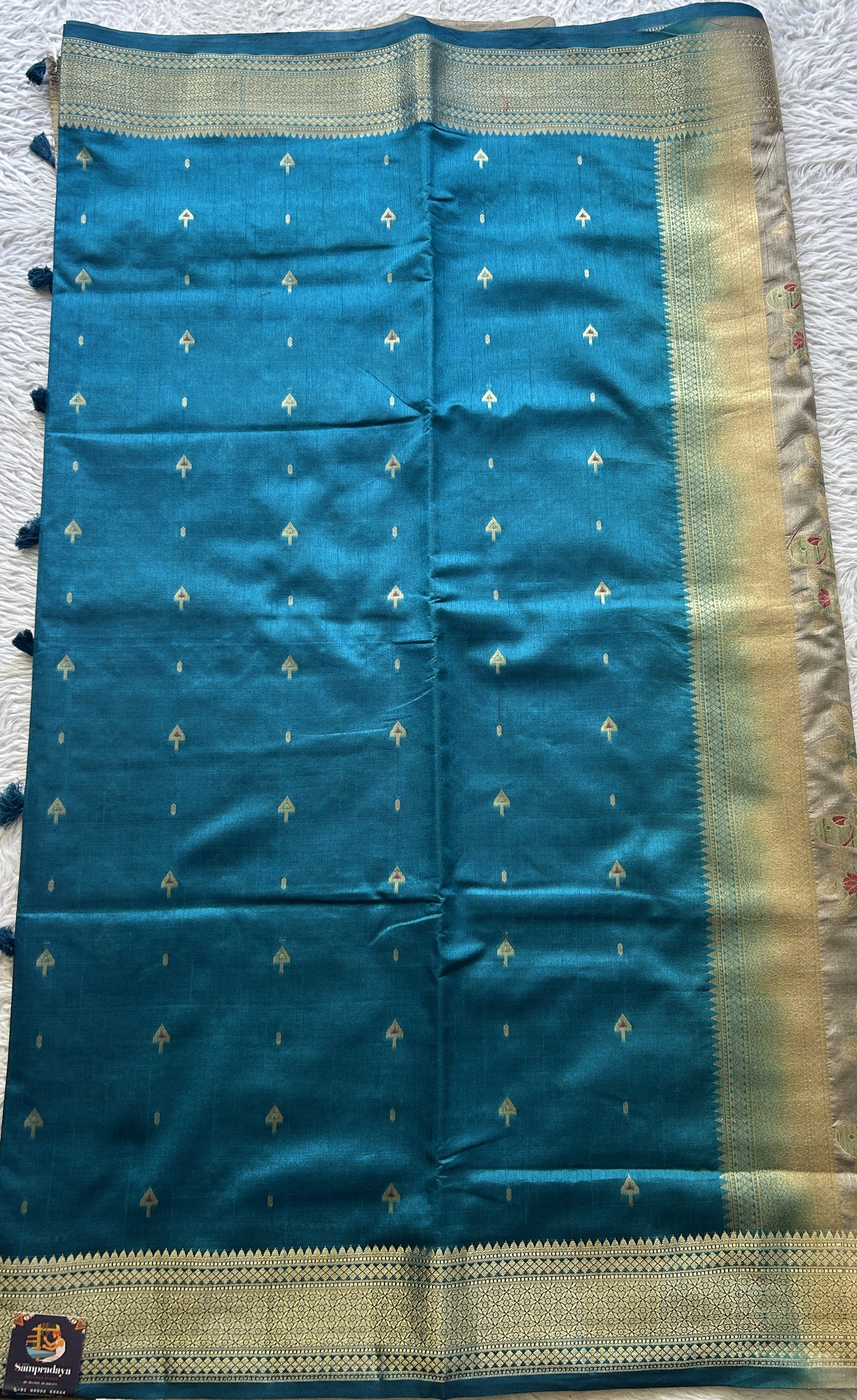 Semi Raw Silk Saree Blue Colored Elegantly Paired with a Zari Border. - Sampradaya Designer Studio