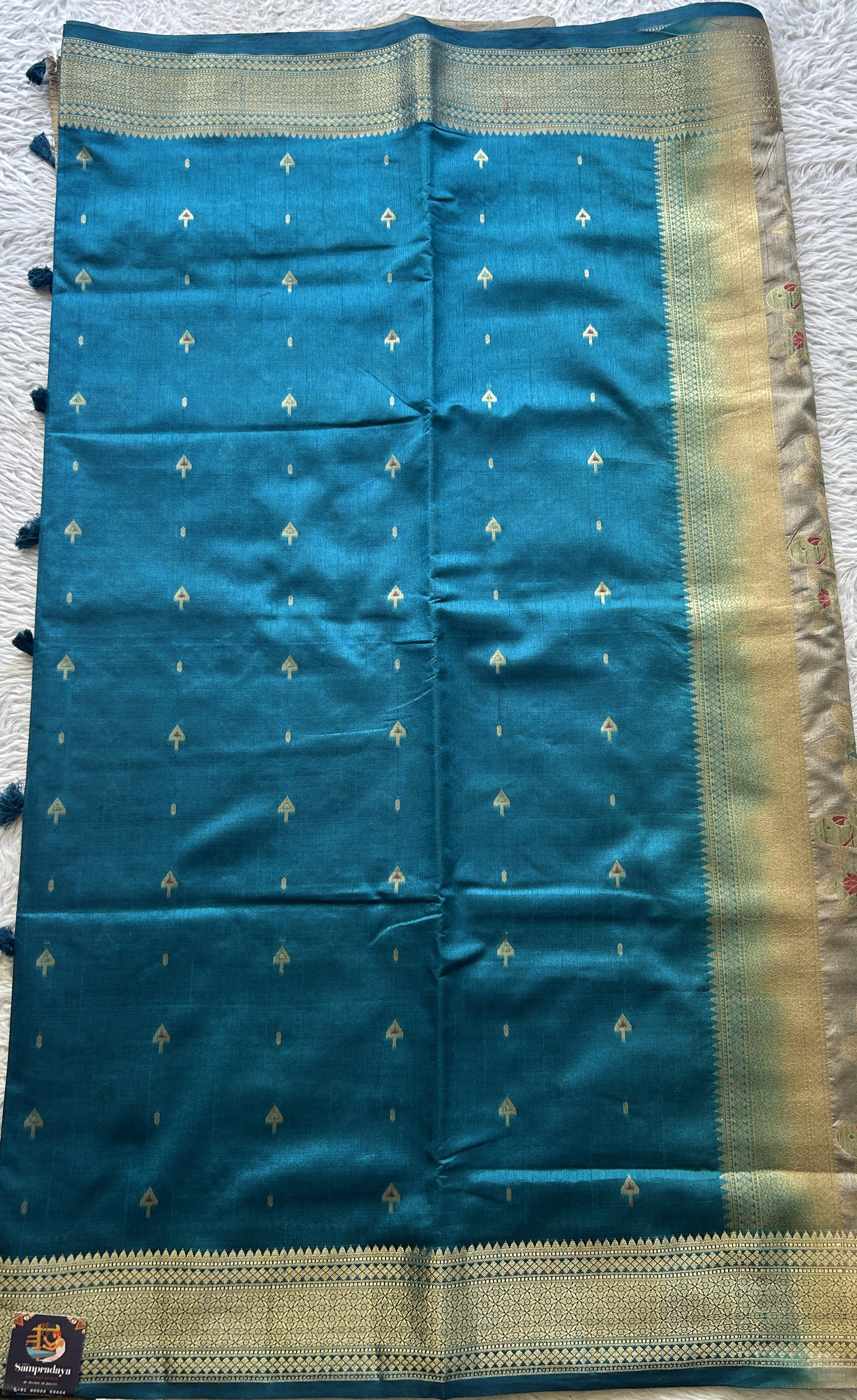 Semi Raw Silk Saree Blue Colored Elegantly Paired with a Zari Border. - Sampradaya Designer Studio