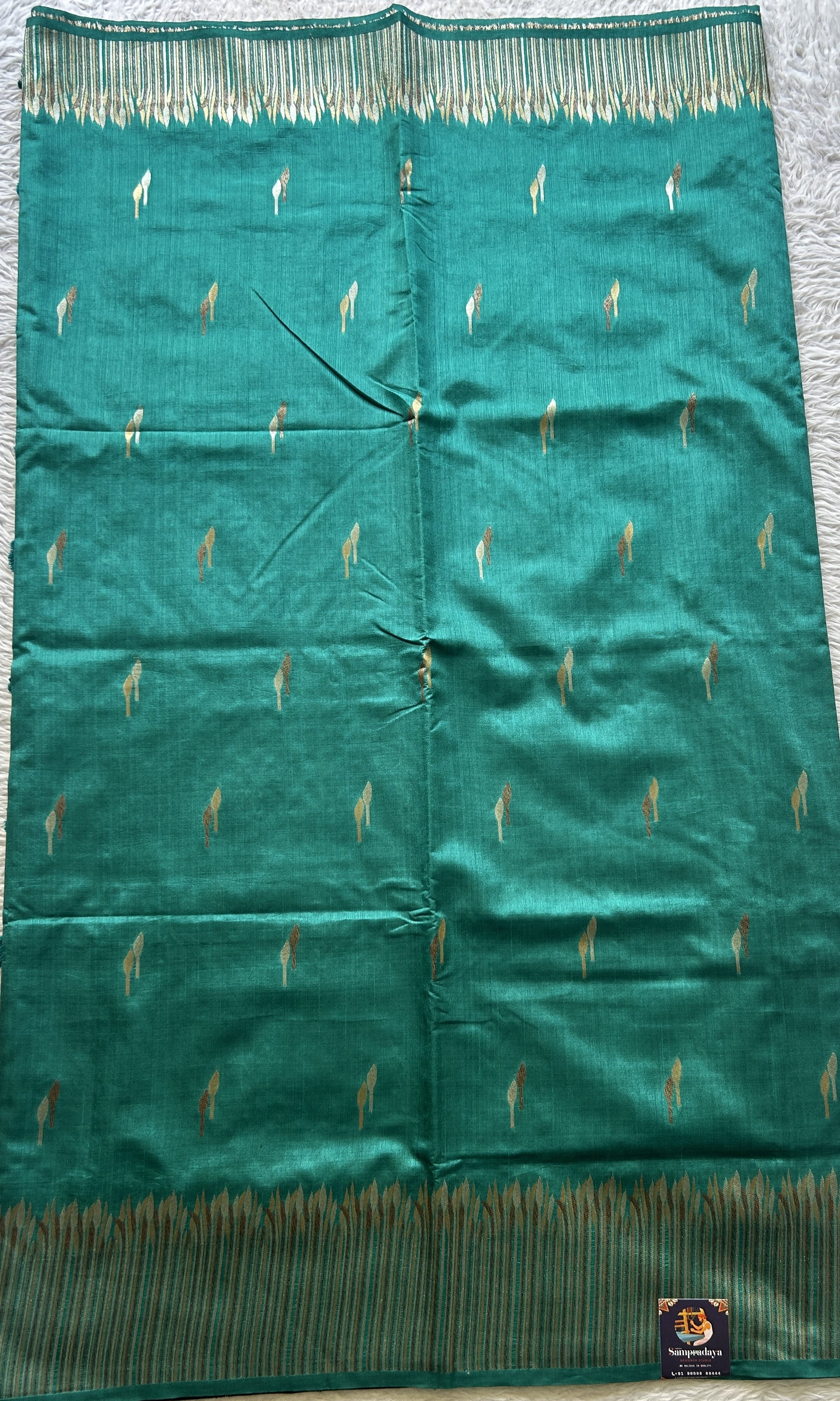Semi Raw Silk Saree Rama Green Colored Elegantly Paired with a Zari Border. - Sampradaya Designer Studio