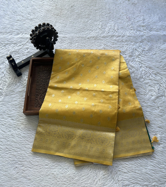 Semi Raw Silk Saree Light Yellow Colored Elegantly Paired with a Zari Border. - Sampradaya Designer Studio