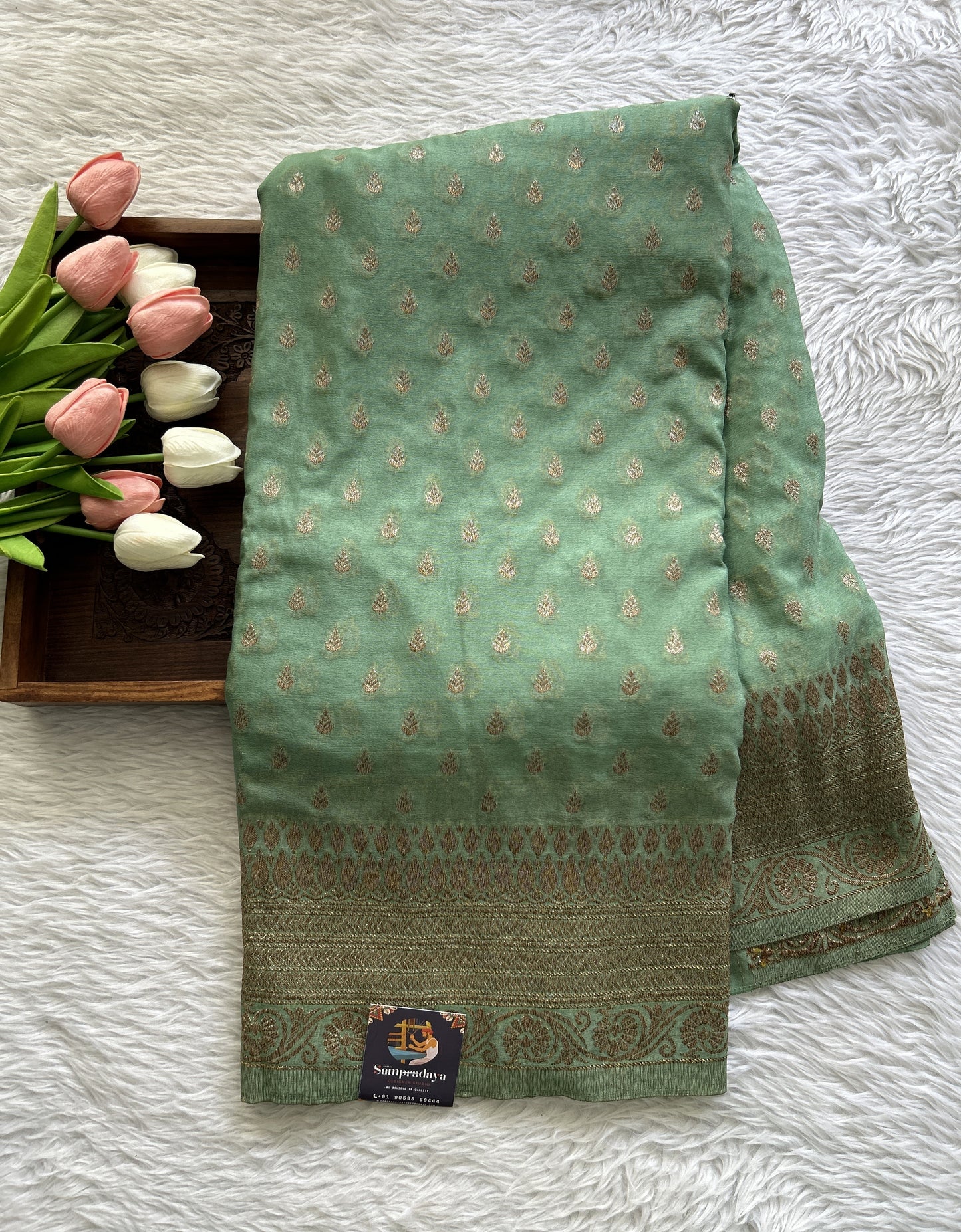 Semi Georgette Saree Sea Green Colored Complemented with a Zari Border. - Sampradaya Designer Studio