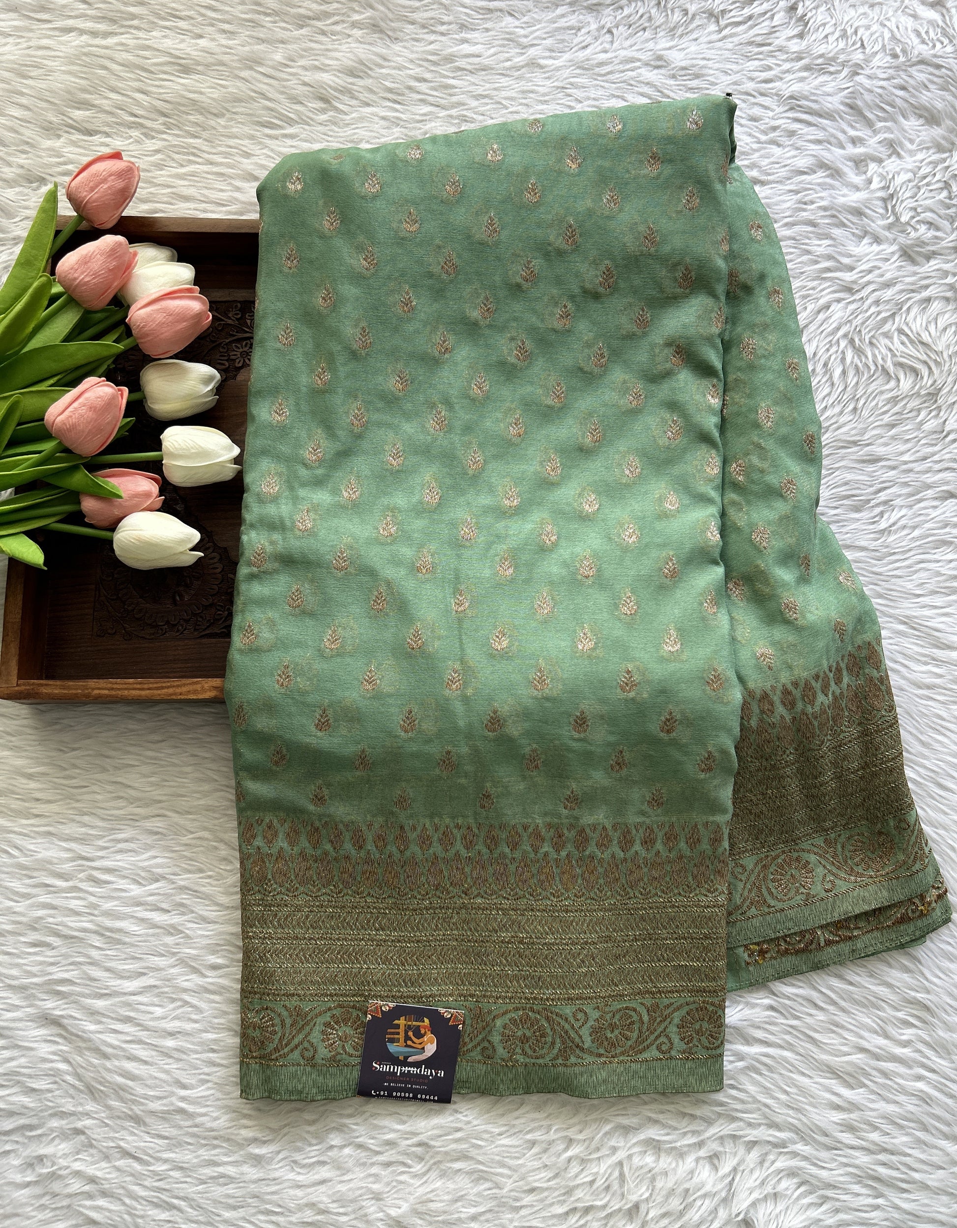Semi Georgette Saree Sea Green Colored Complemented with a Zari Border. - Sampradaya Designer Studio