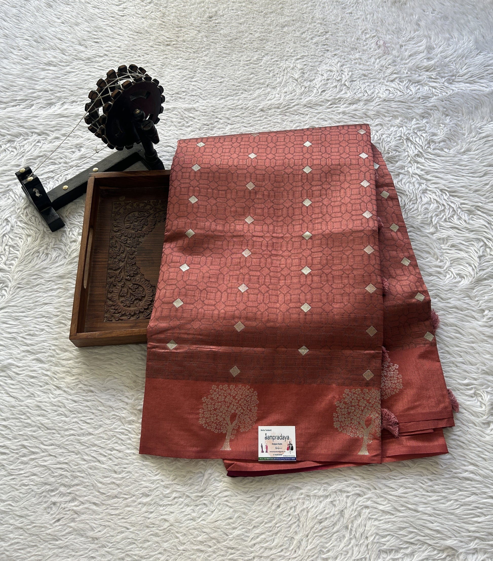 Semi Tussar Saree Rust Colored complemented with a Buti Border. - Sampradaya Designer Studio