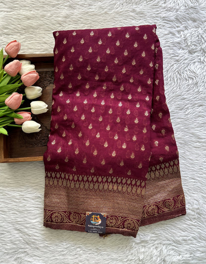 Semi Georgette Saree Magenta Colored Complemented with a Zari Border. - Sampradaya Designer Studio