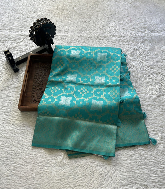 Semi Raw Silk Allover Saree Aqua Blue Colored Elegantly Paired with a Zari Border. - Sampradaya Designer Studio