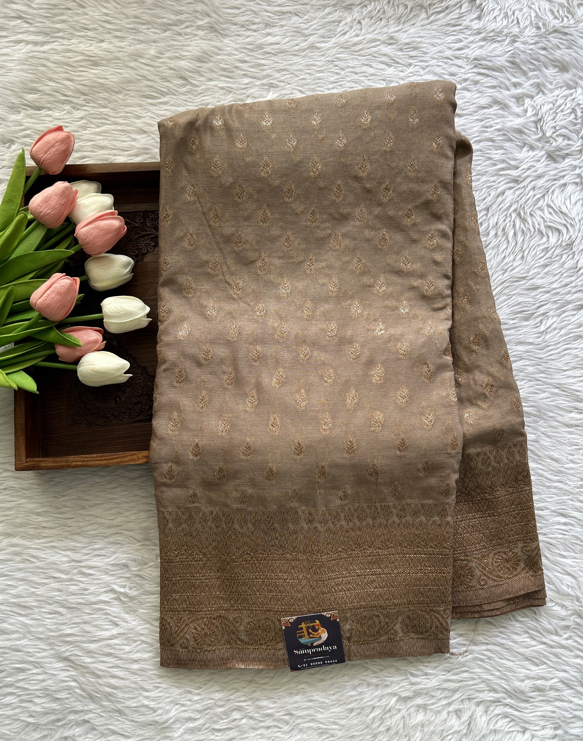 Semi Georgette Saree Beige Colored Complemented with a Zari Border. - Sampradaya Designer Studio
