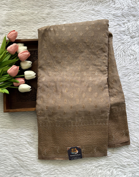 Semi Georgette Saree Beige Colored Complemented with a Zari Border. - Sampradaya Designer Studio