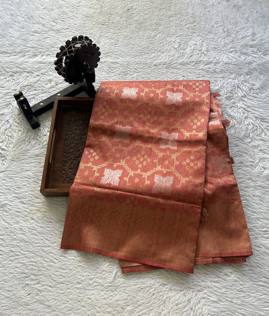Semi Raw Silk Allover Saree Coral Colored Elegantly Paired with a Zari Border. - Sampradaya Designer Studio