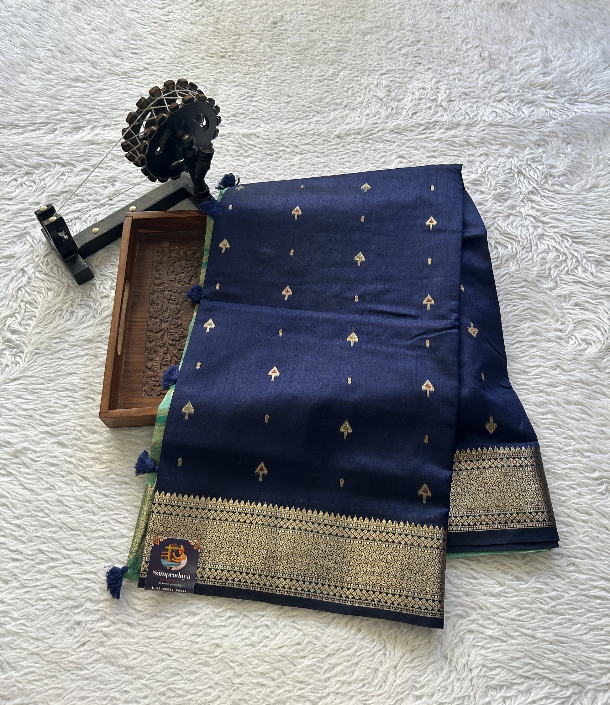 Semi Raw Silk Allover Saree Navy Blue Colored Elegantly Paired with a Zari Border. - Sampradaya Designer Studio