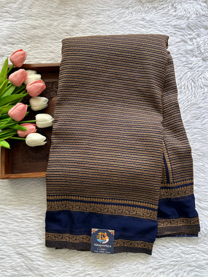 Semi Georgette Saree Ink Blue Colored Complemented with a Zari Border. - Sampradaya Designer Studio