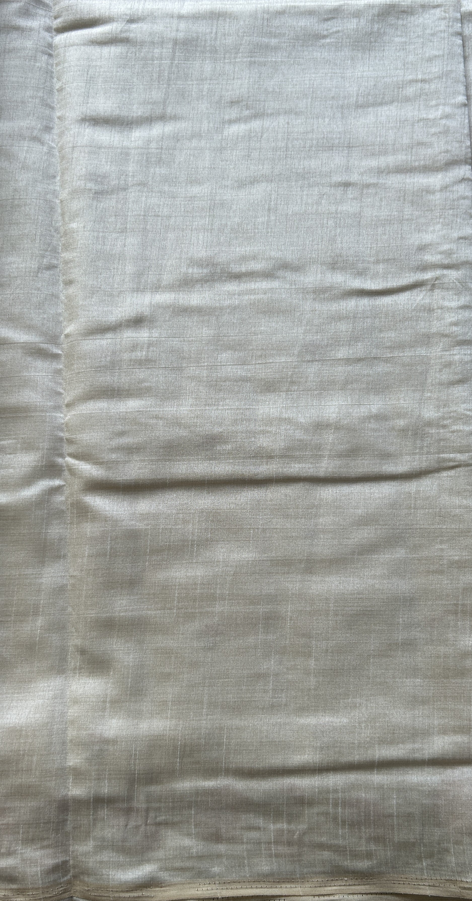 Semi Tussar Saree Pastel Cream Colored complemented with a Embroidered Scallop Border. - Sampradaya Designer Studio
