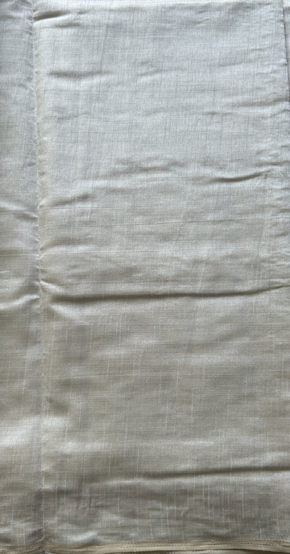 Semi Tussar Saree Pastel Cream Colored complemented with a Embroidered Scallop Border. - Sampradaya Designer Studio