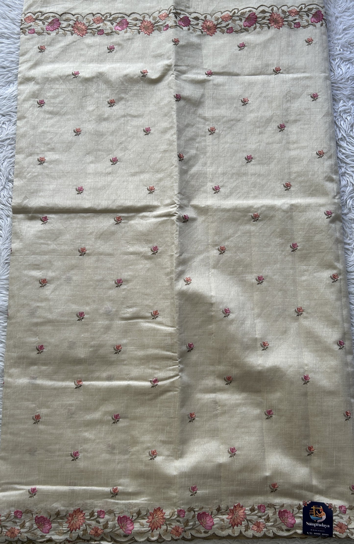 Semi Tussar Saree Pastel Cream Colored complemented with a Embroidered Scallop Border. - Sampradaya Designer Studio