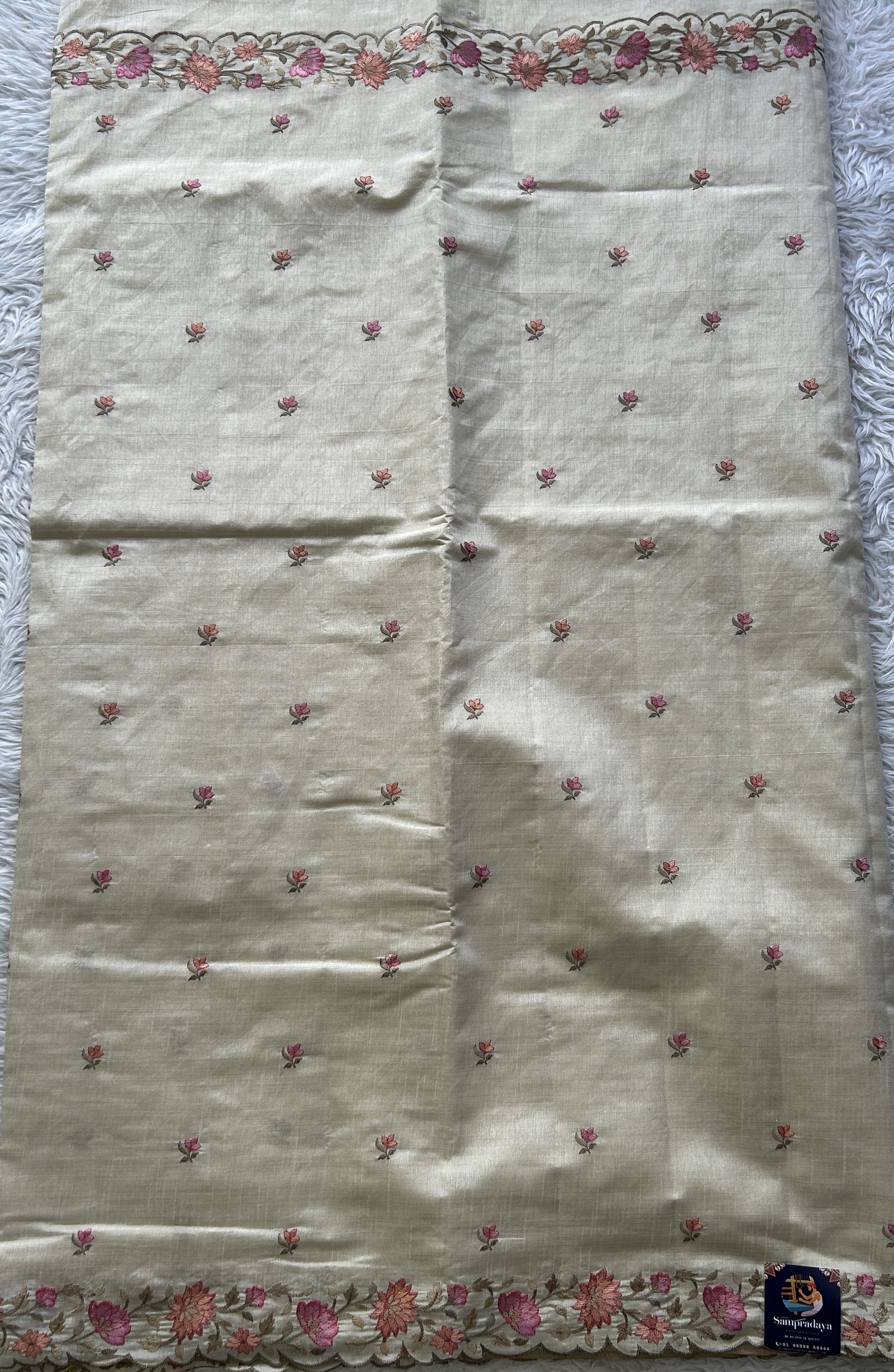 Semi Tussar Saree Pastel Cream Colored complemented with a Embroidered Scallop Border. - Sampradaya Designer Studio