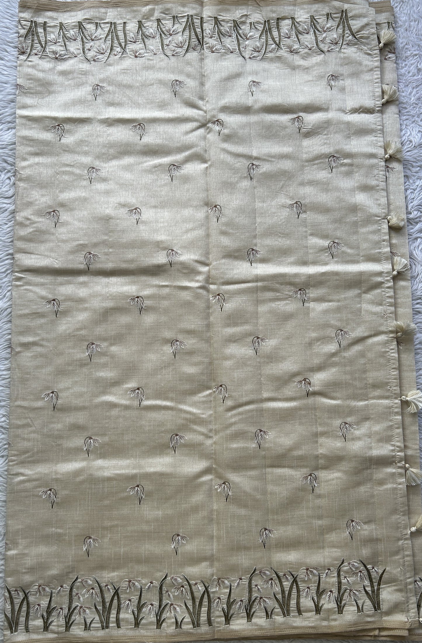 Semi Tussar Saree Pearl Colored complemented with a Embroidered Scallop Border. - Sampradaya Designer Studio