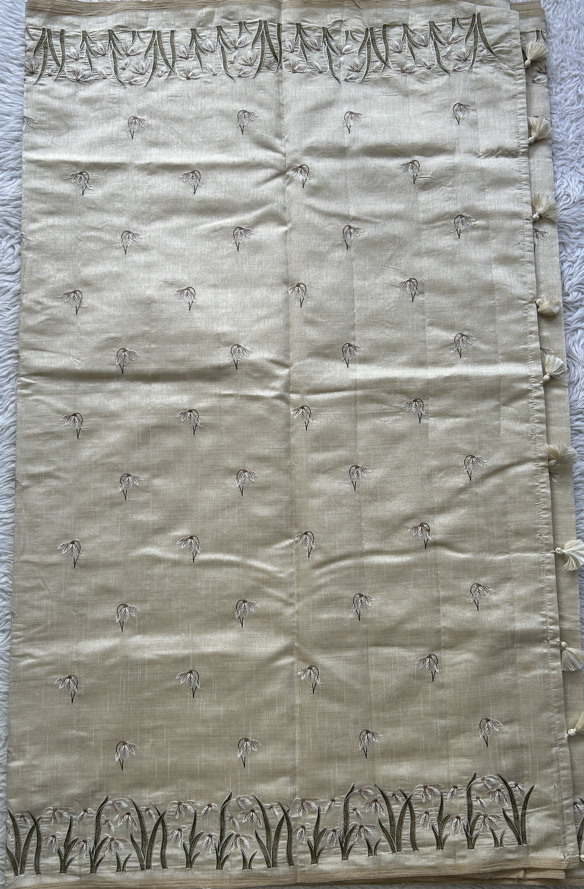 Semi Tussar Saree Pearl Colored complemented with a Embroidered Scallop Border. - Sampradaya Designer Studio