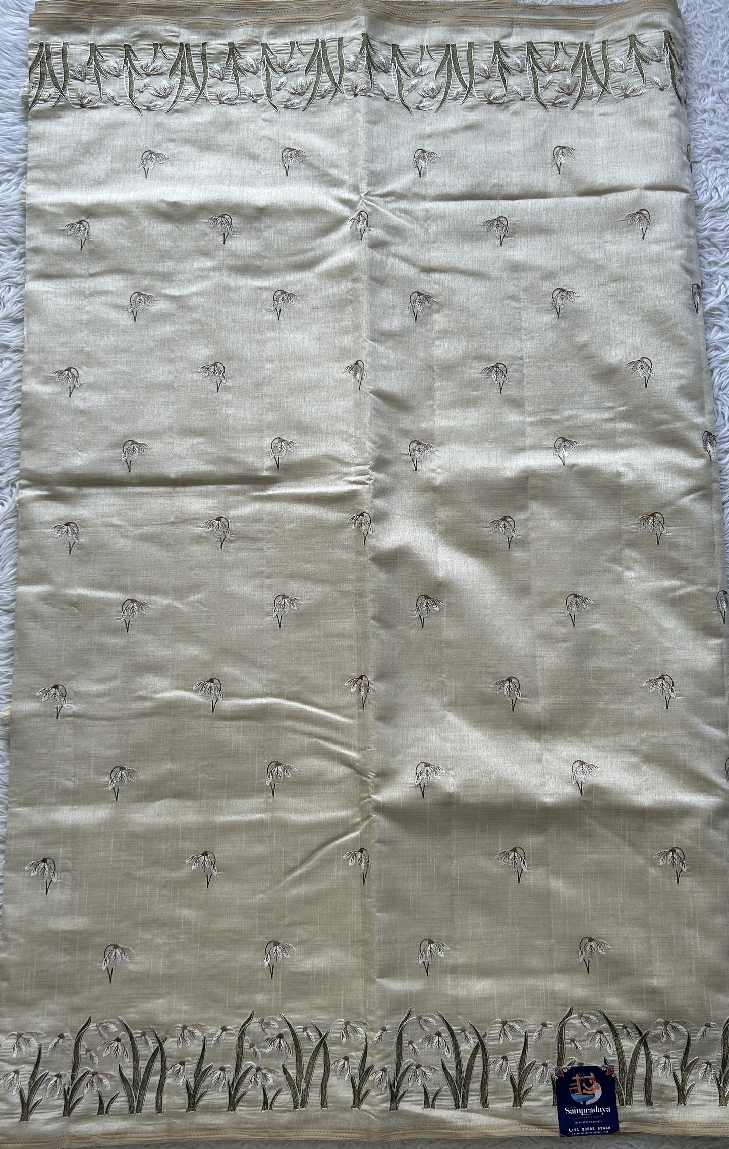 Semi Tussar Saree Pearl Colored complemented with a Embroidered Scallop Border. - Sampradaya Designer Studio