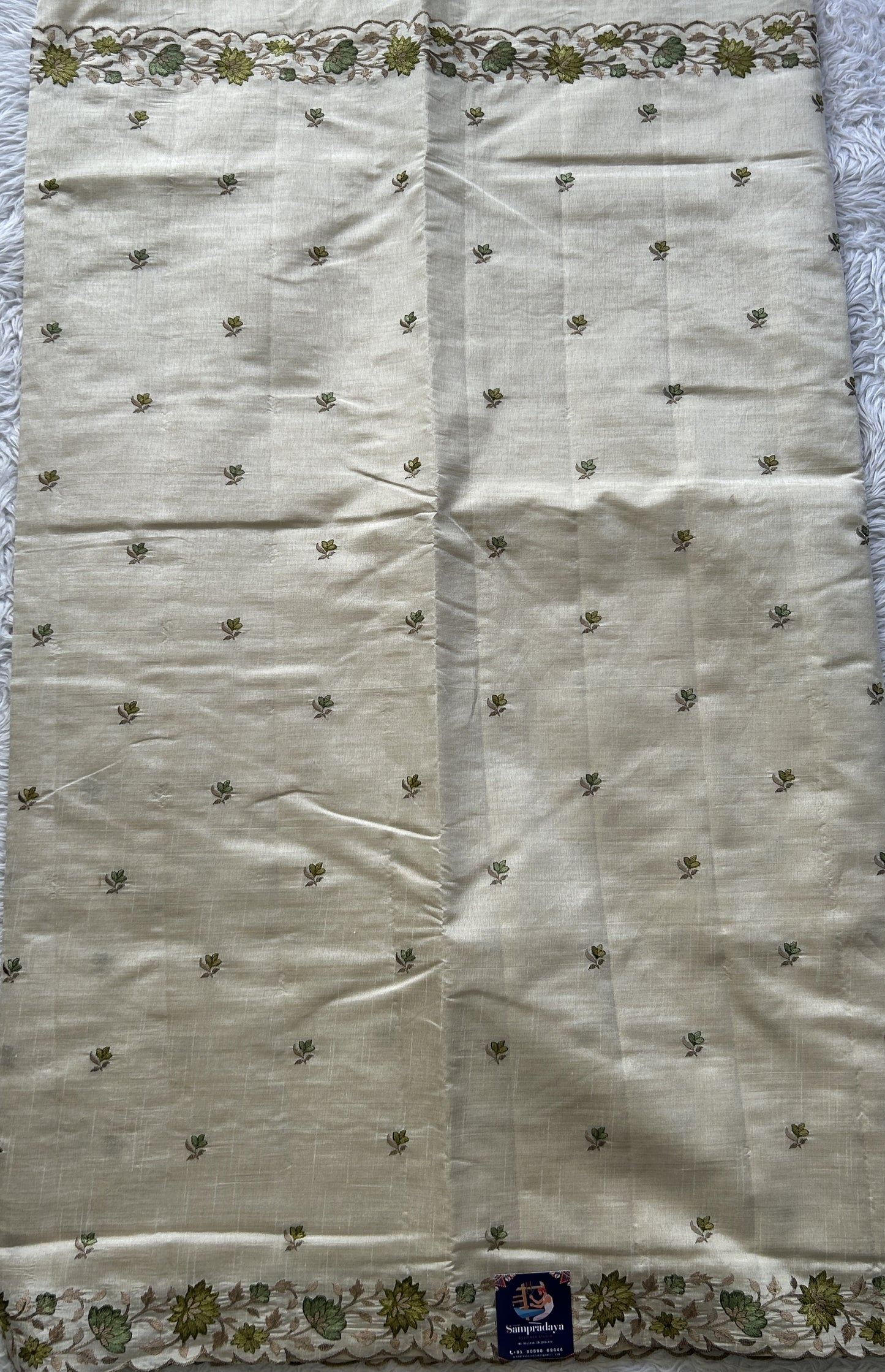 Semi Tussar Saree Off White Colored complemented with a Embroidered Scallop Border. - Sampradaya Designer Studio
