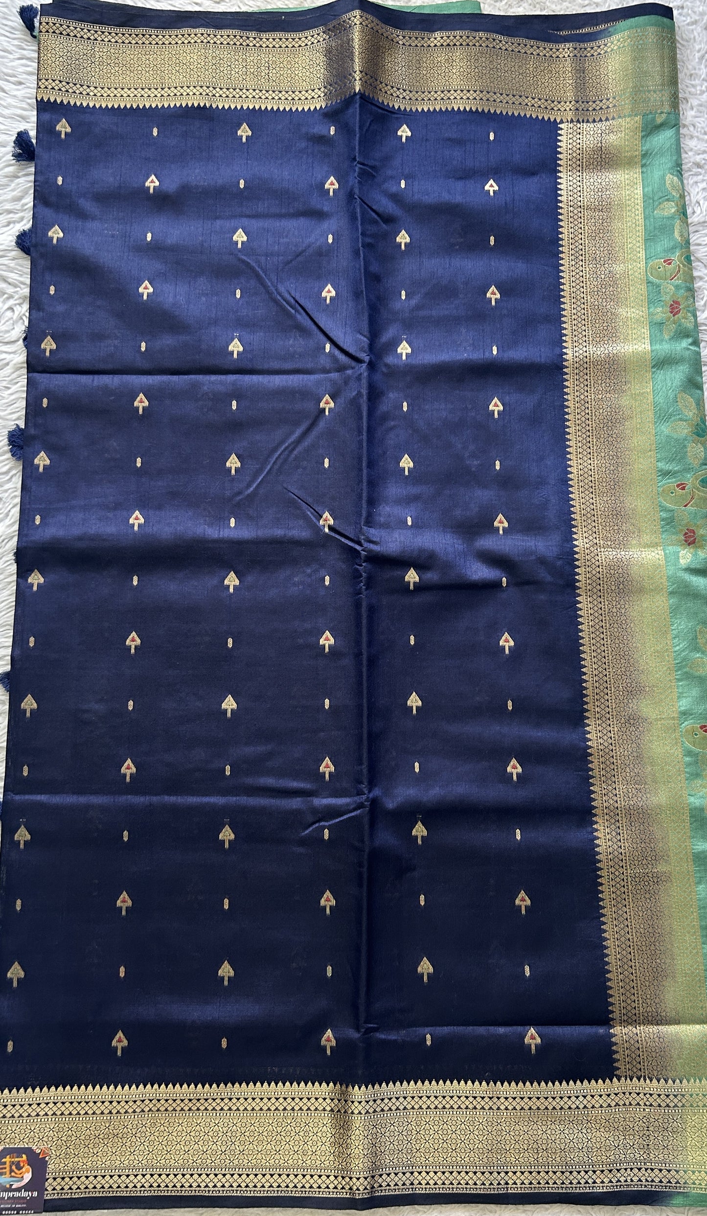 Semi Raw Silk Allover Saree Navy Blue Colored Elegantly Paired with a Zari Border. - Sampradaya Designer Studio