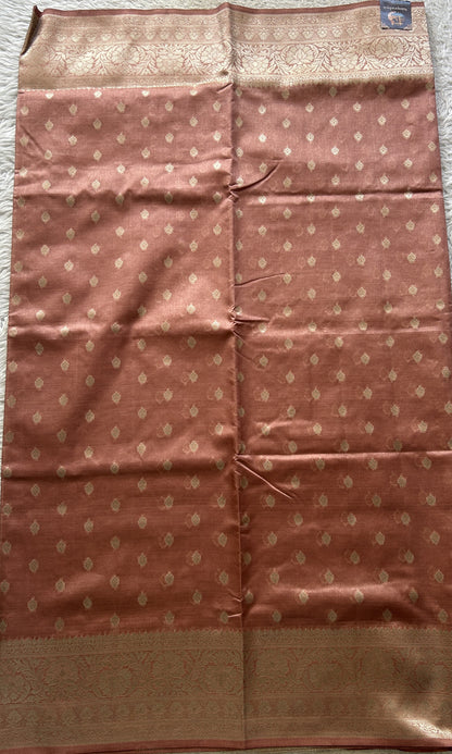 Semi Raw Silk Allover Saree Deep Peach Colored Elegantly Paired with a Zari Border. - Sampradaya Designer Studio