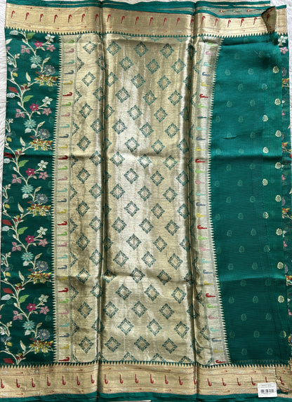 Silk kota Saree Bottle Green color complemented with a Muniya Border. - Sampradaya Designer Studio