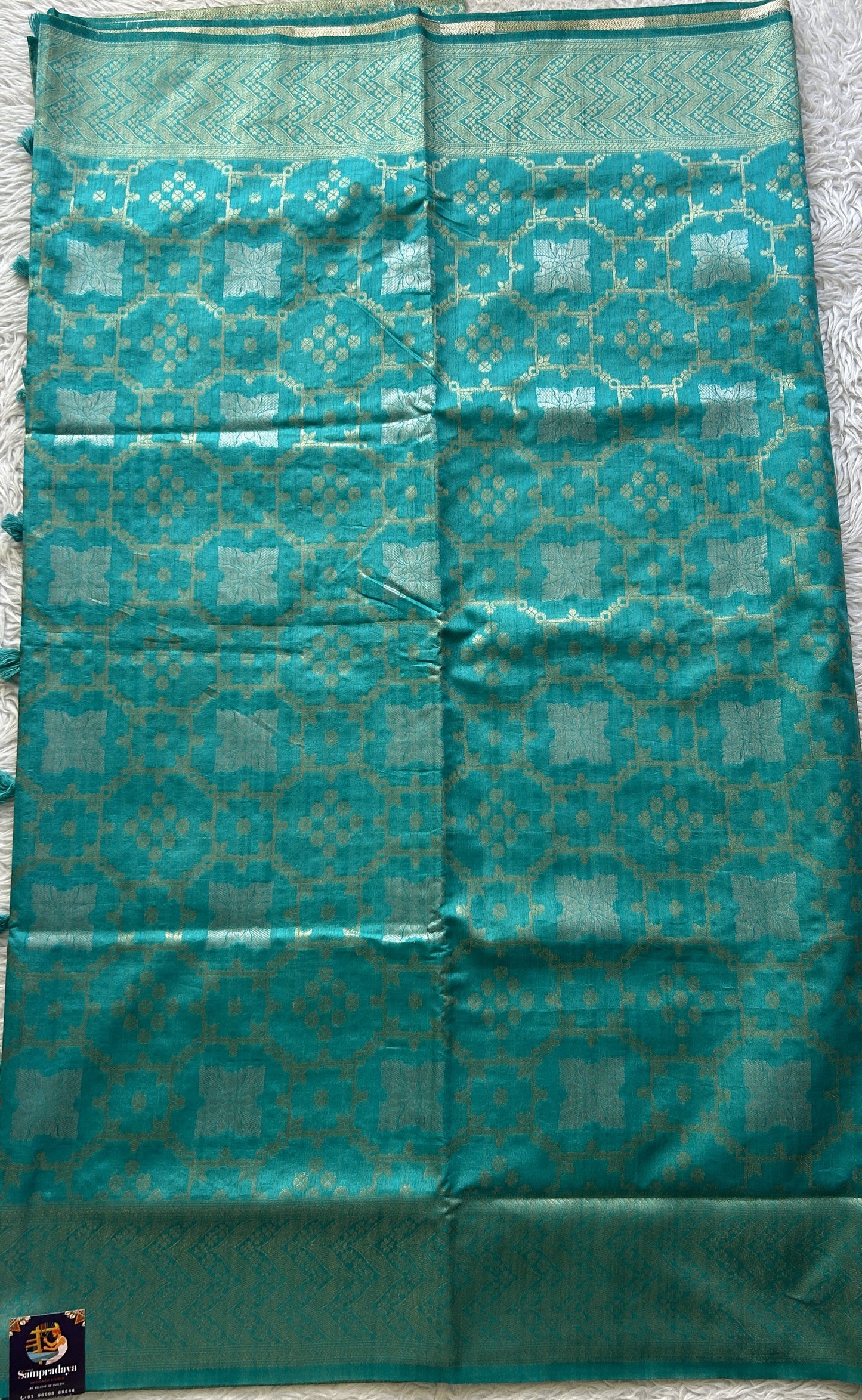 Semi Raw Silk Allover Saree Aqua Blue Colored Elegantly Paired with a Zari Border. - Sampradaya Designer Studio