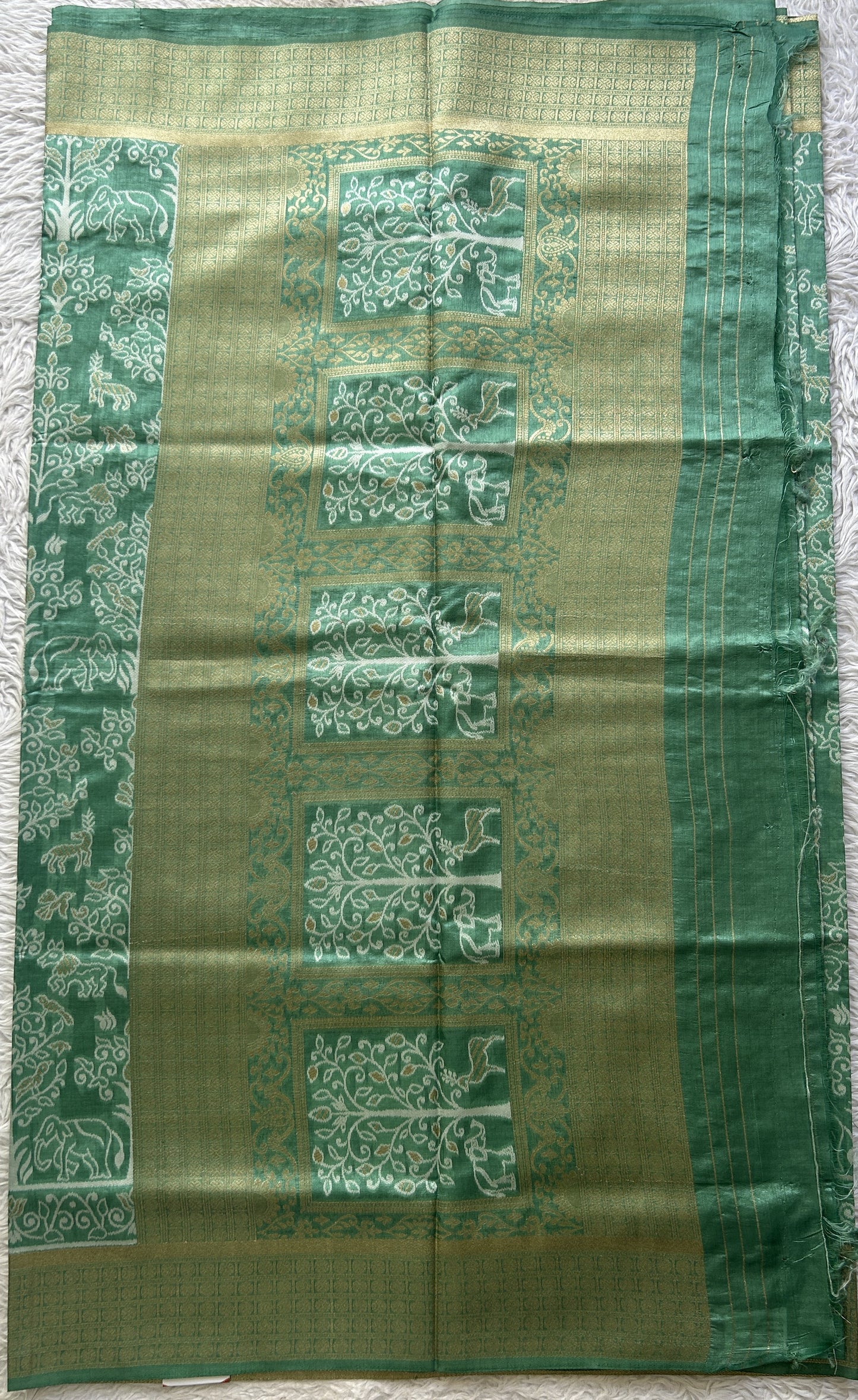 Semi Raw Silk Allover Saree Emerald Green Colored Elegantly Paired with a Zari Border. - Sampradaya Designer Studio