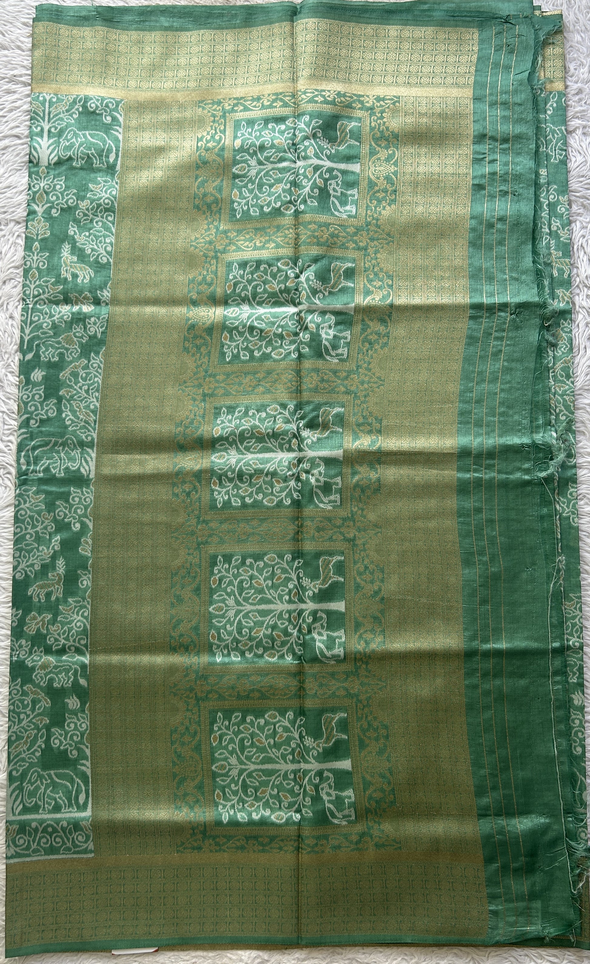 Semi Raw Silk Allover Saree Emerald Green Colored Elegantly Paired with a Zari Border. - Sampradaya Designer Studio