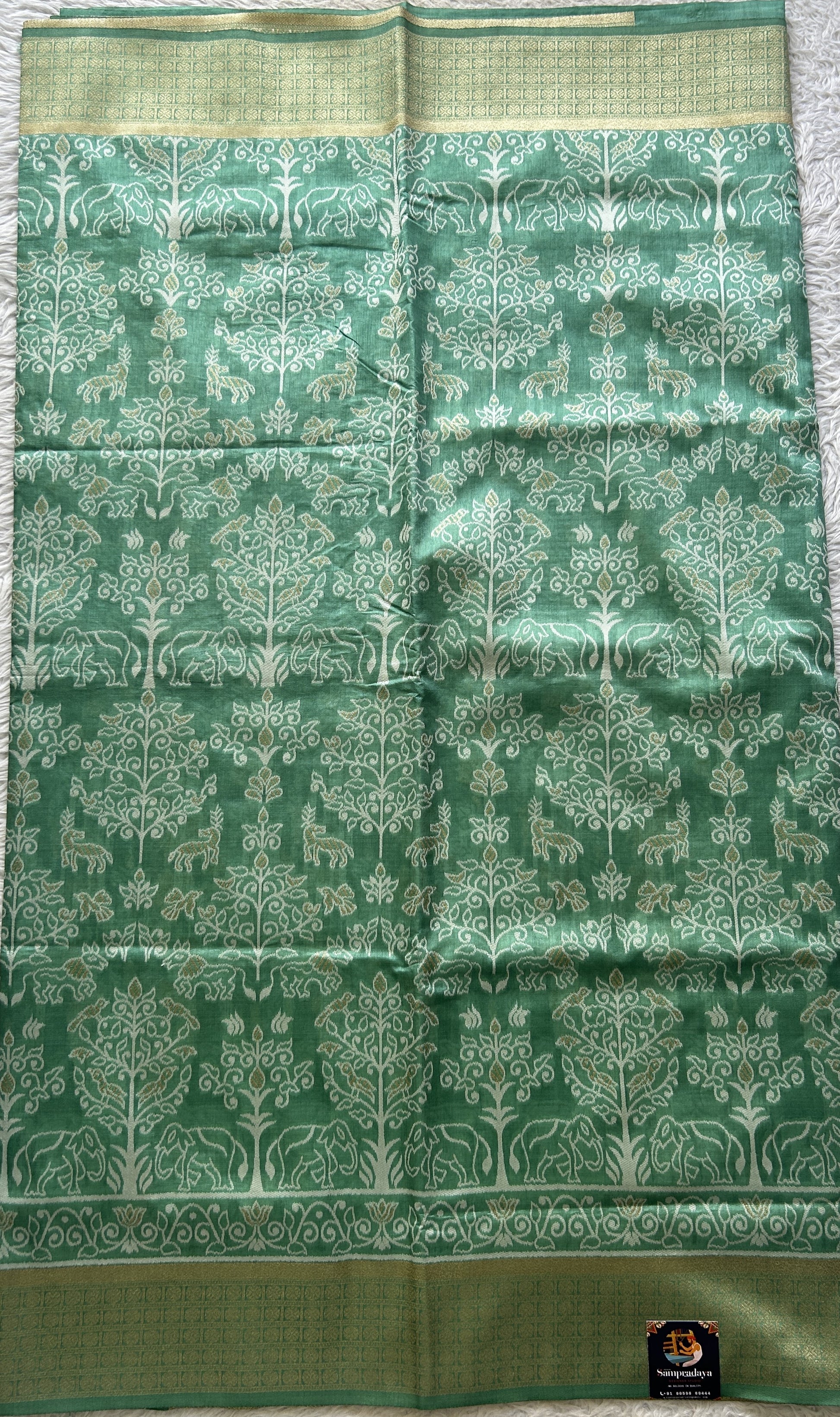 Semi Raw Silk Allover Saree Emerald Green Colored Elegantly Paired with a Zari Border. - Sampradaya Designer Studio