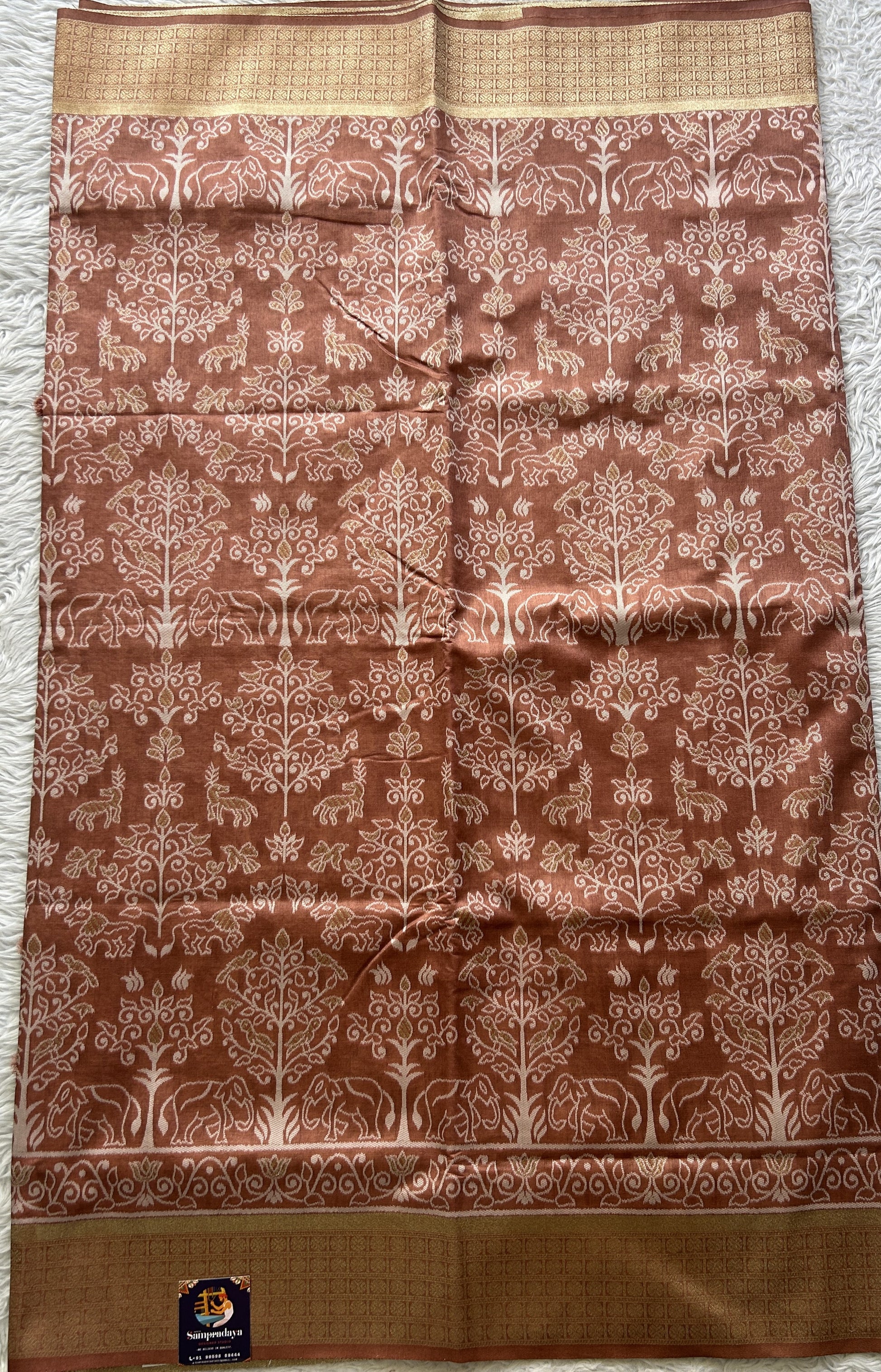 Semi Raw Silk Allover Saree Brown Colored Elegantly Paired with a Zari Border. - Sampradaya Designer Studio