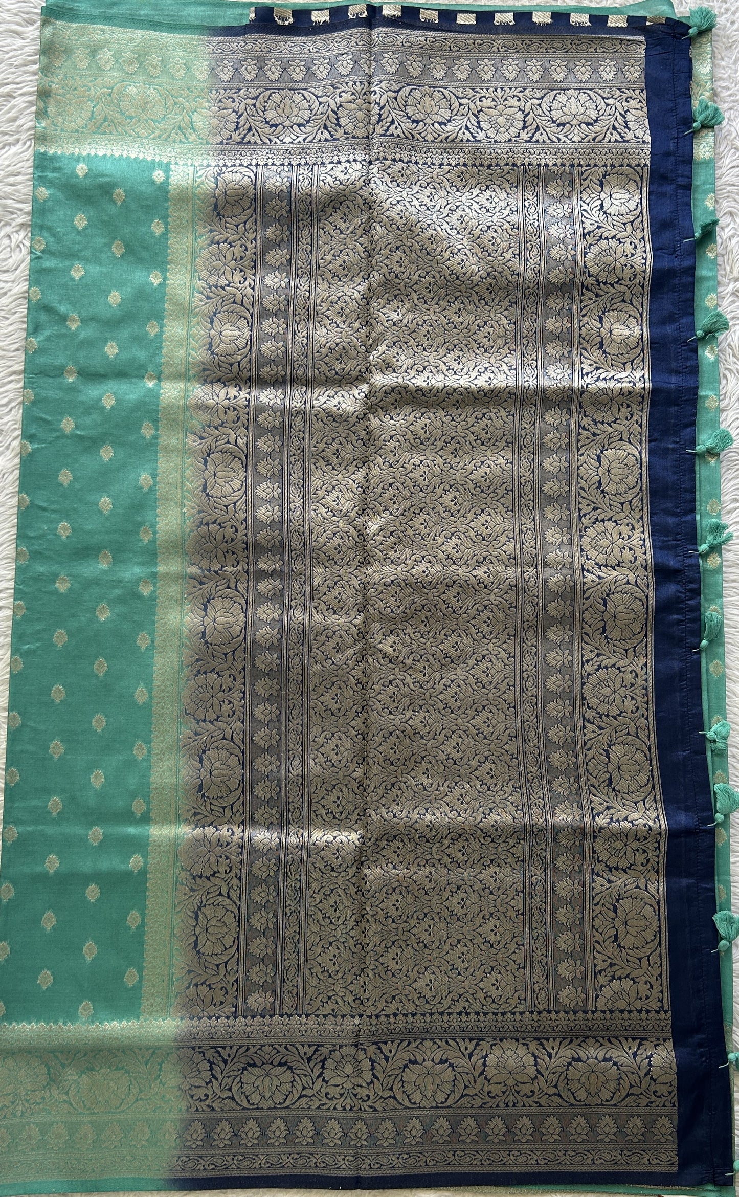 Semi Raw Silk Saree Sea Green Colored Elegantly Paired with a Zari Border. - Sampradaya Designer Studio
