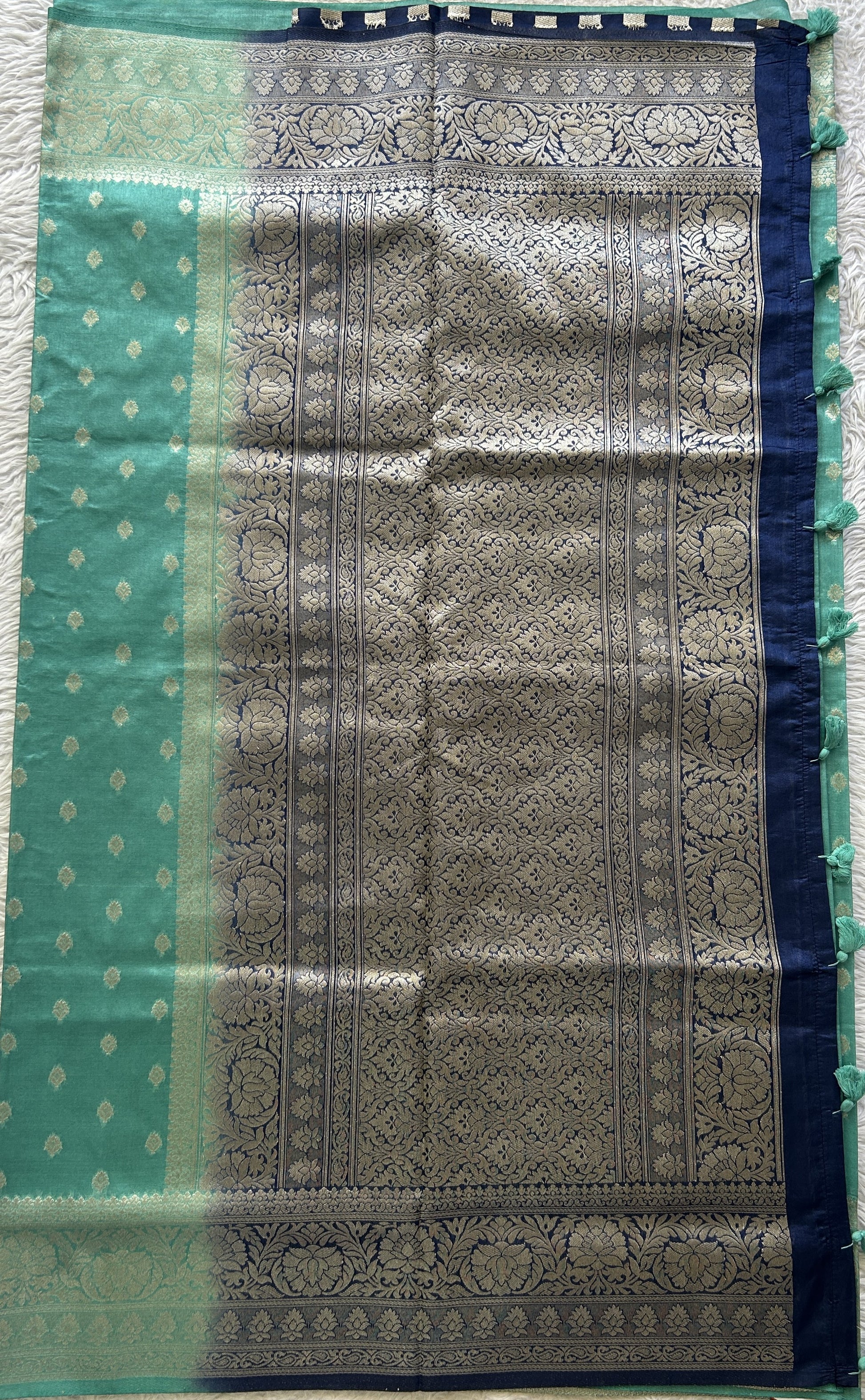 Semi Raw Silk Saree Sea Green Colored Elegantly Paired with a Zari Border. - Sampradaya Designer Studio
