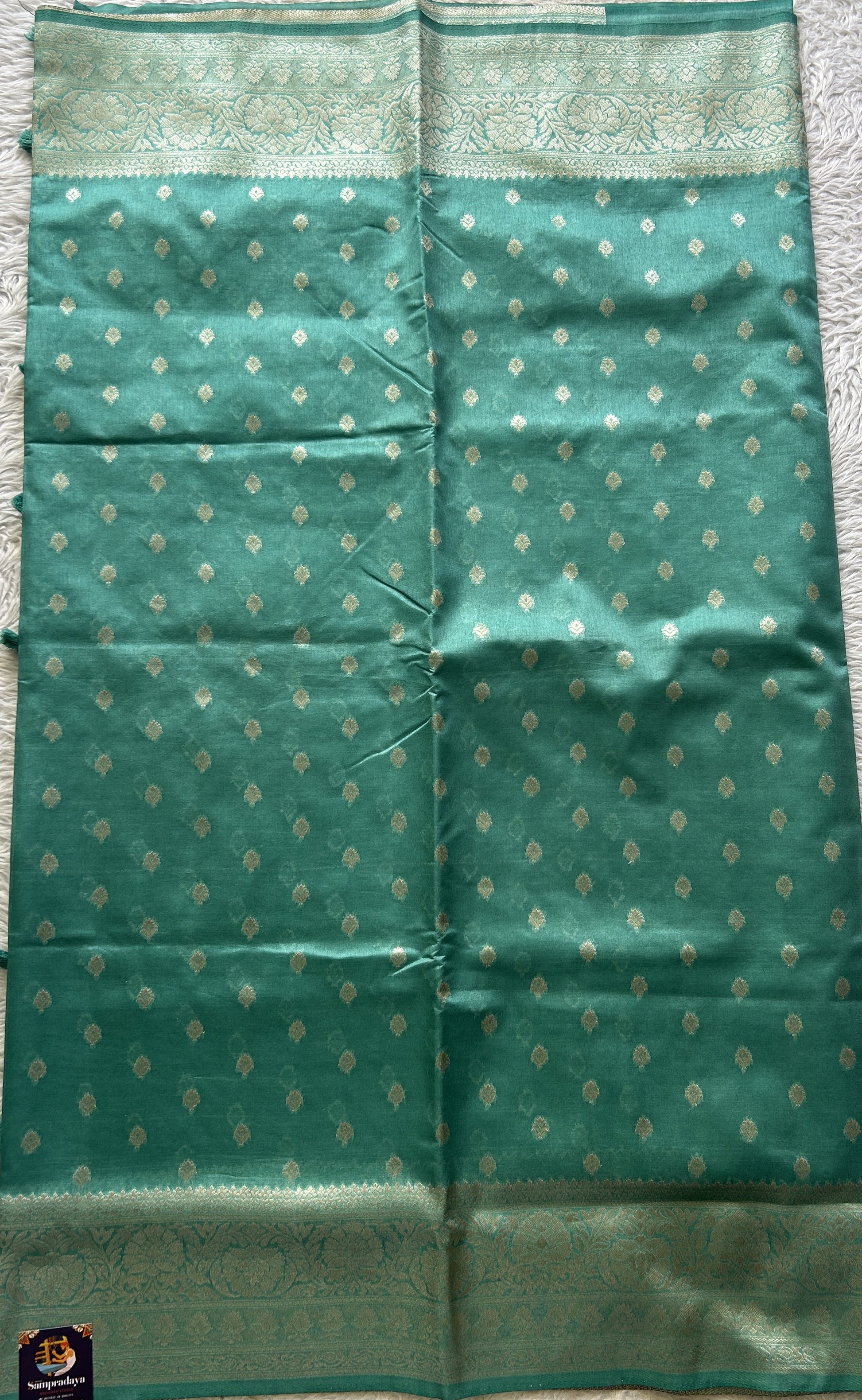 Semi Raw Silk Saree Sea Green Colored Elegantly Paired with a Zari Border. - Sampradaya Designer Studio