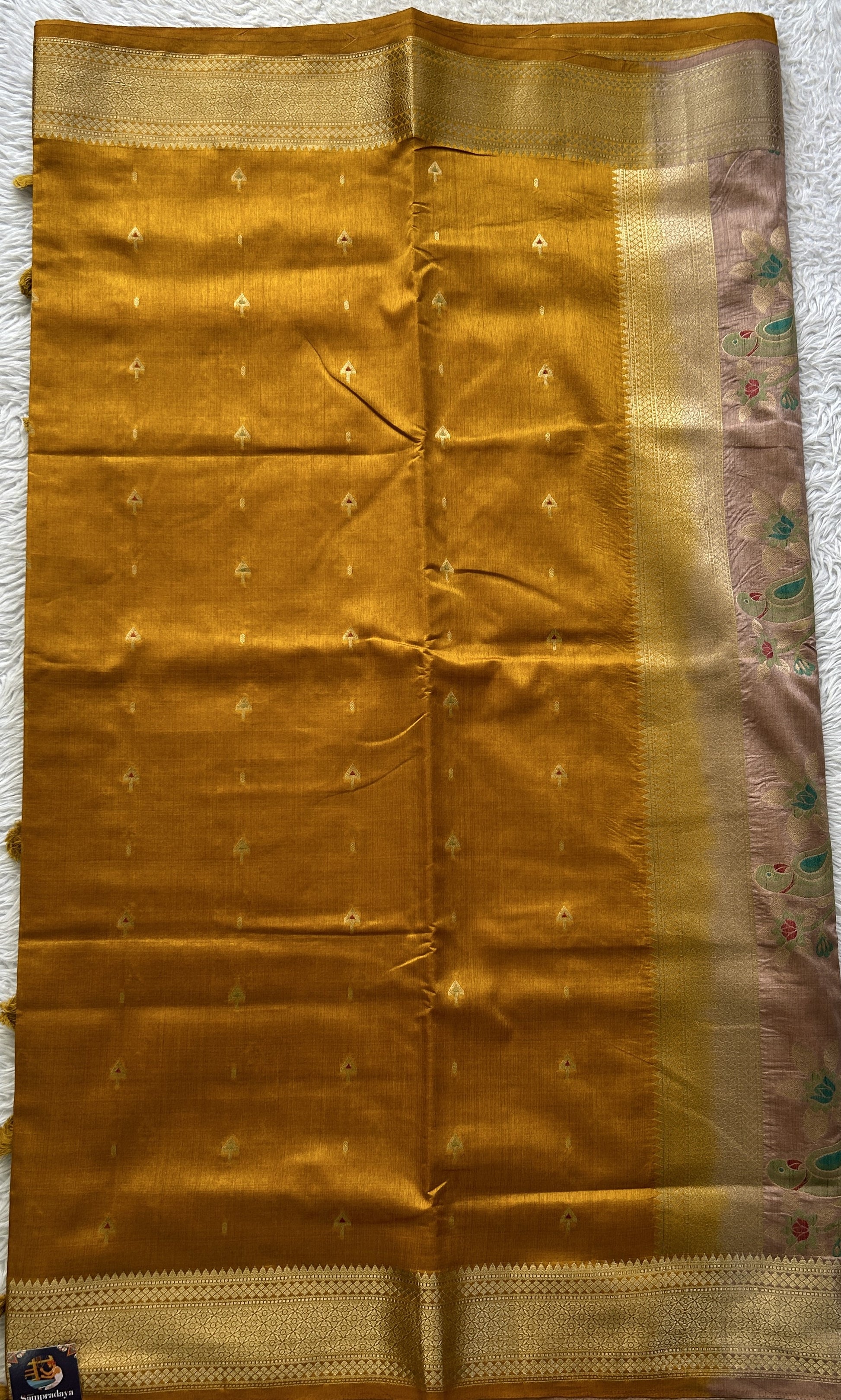 Semi Raw Silk Saree Yellow Colored Elegantly Paired with a Zari Border. - Sampradaya Designer Studio