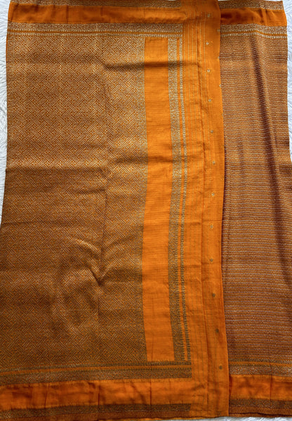 Semi Georgette Saree Orange Colored Complemented with a Zari Border. - Sampradaya Designer Studio