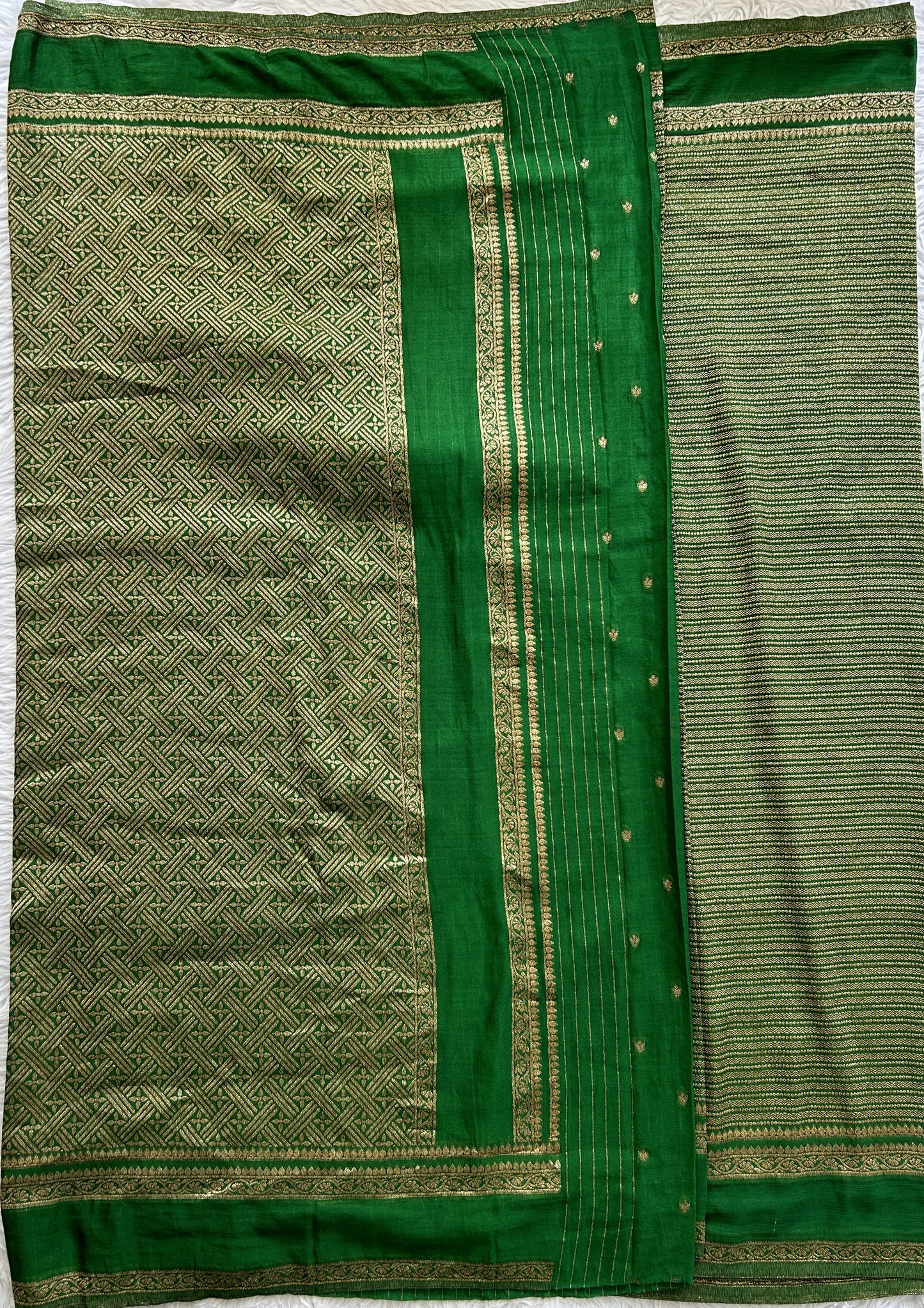 Semi Georgette Saree Green Colored Complemented with a Zari Border. - Sampradaya Designer Studio