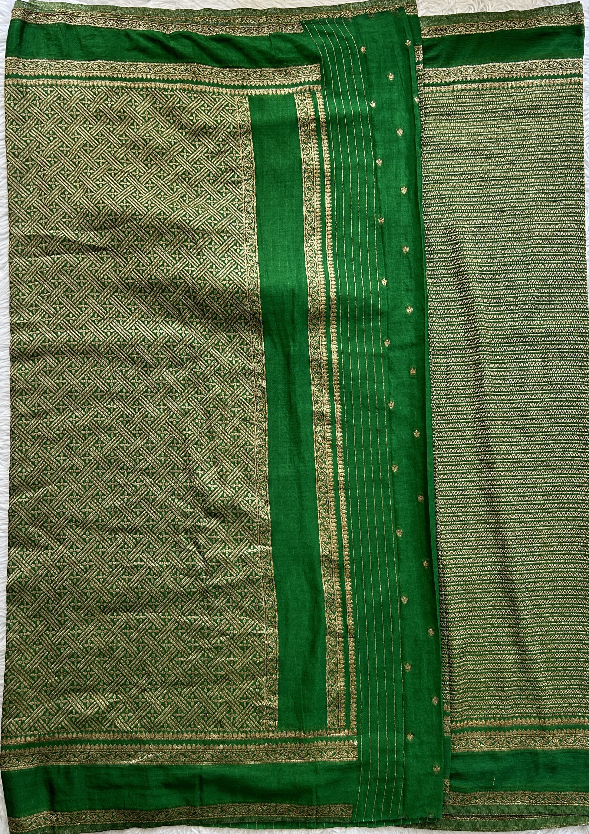 Semi Georgette Saree Green Colored Complemented with a Zari Border. - Sampradaya Designer Studio
