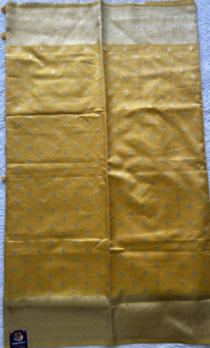 Semi Raw Silk Saree Light Yellow Colored Elegantly Paired with a Zari Border. - Sampradaya Designer Studio