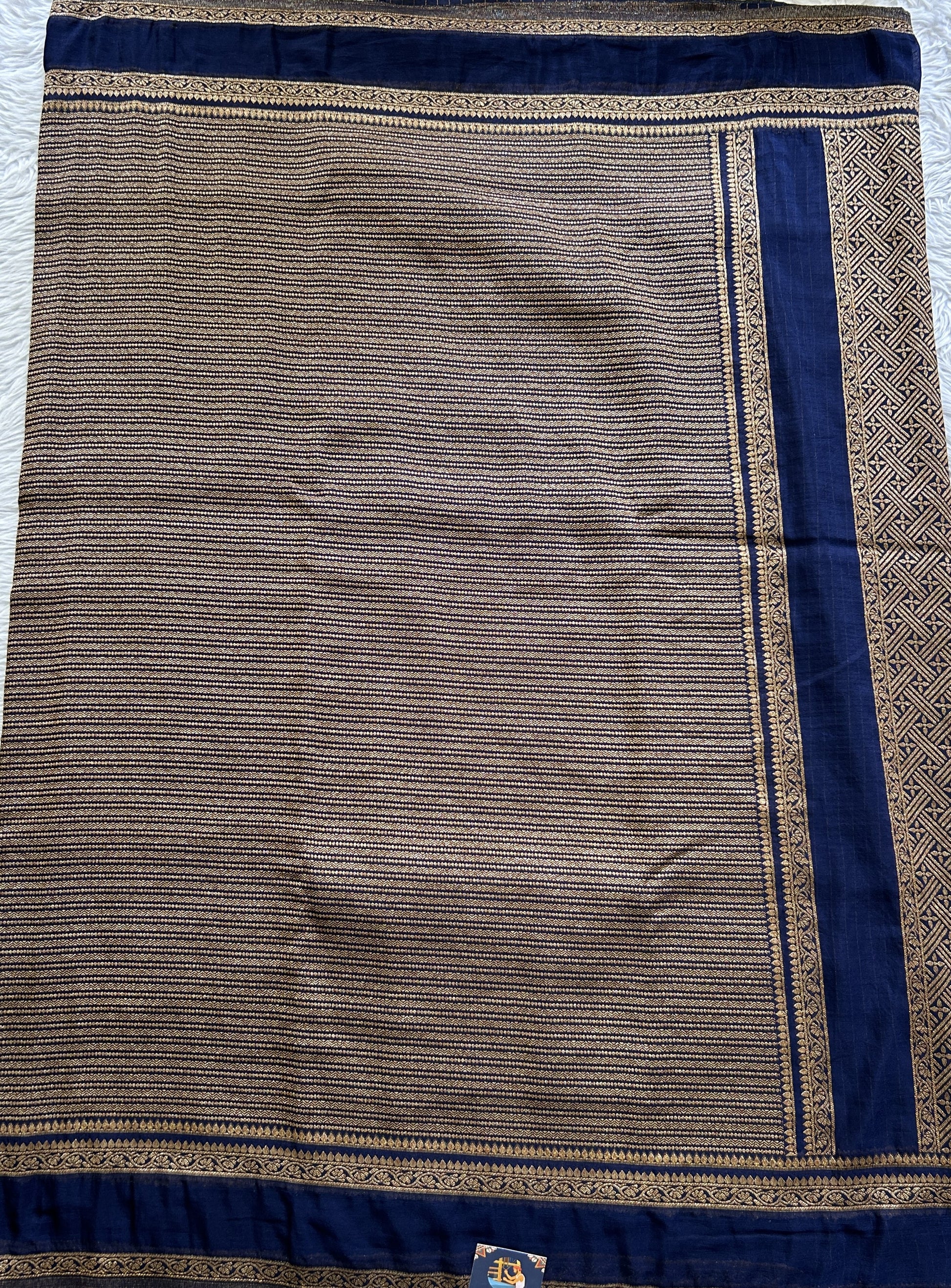 Semi Georgette Saree Ink Blue Colored Complemented with a Zari Border. - Sampradaya Designer Studio