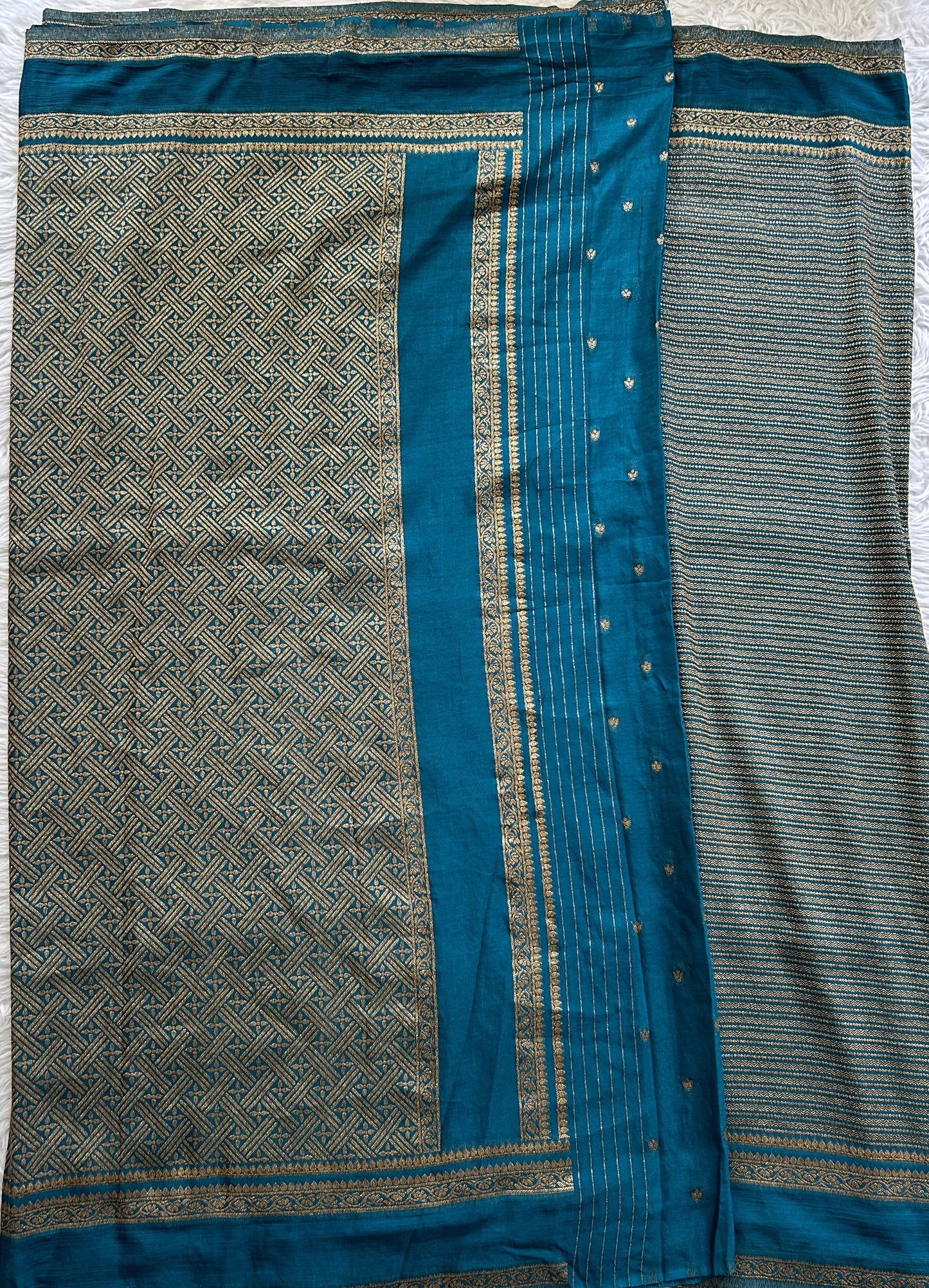 Semi Georgette Saree Turquoise Blue Colored Complemented with a Zari Border. - Sampradaya Designer Studio