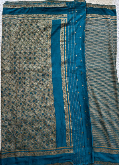Semi Georgette Saree Turquoise Blue Colored Complemented with a Zari Border. - Sampradaya Designer Studio