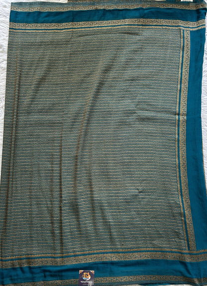 Semi Georgette Saree Turquoise Blue Colored Complemented with a Zari Border. - Sampradaya Designer Studio
