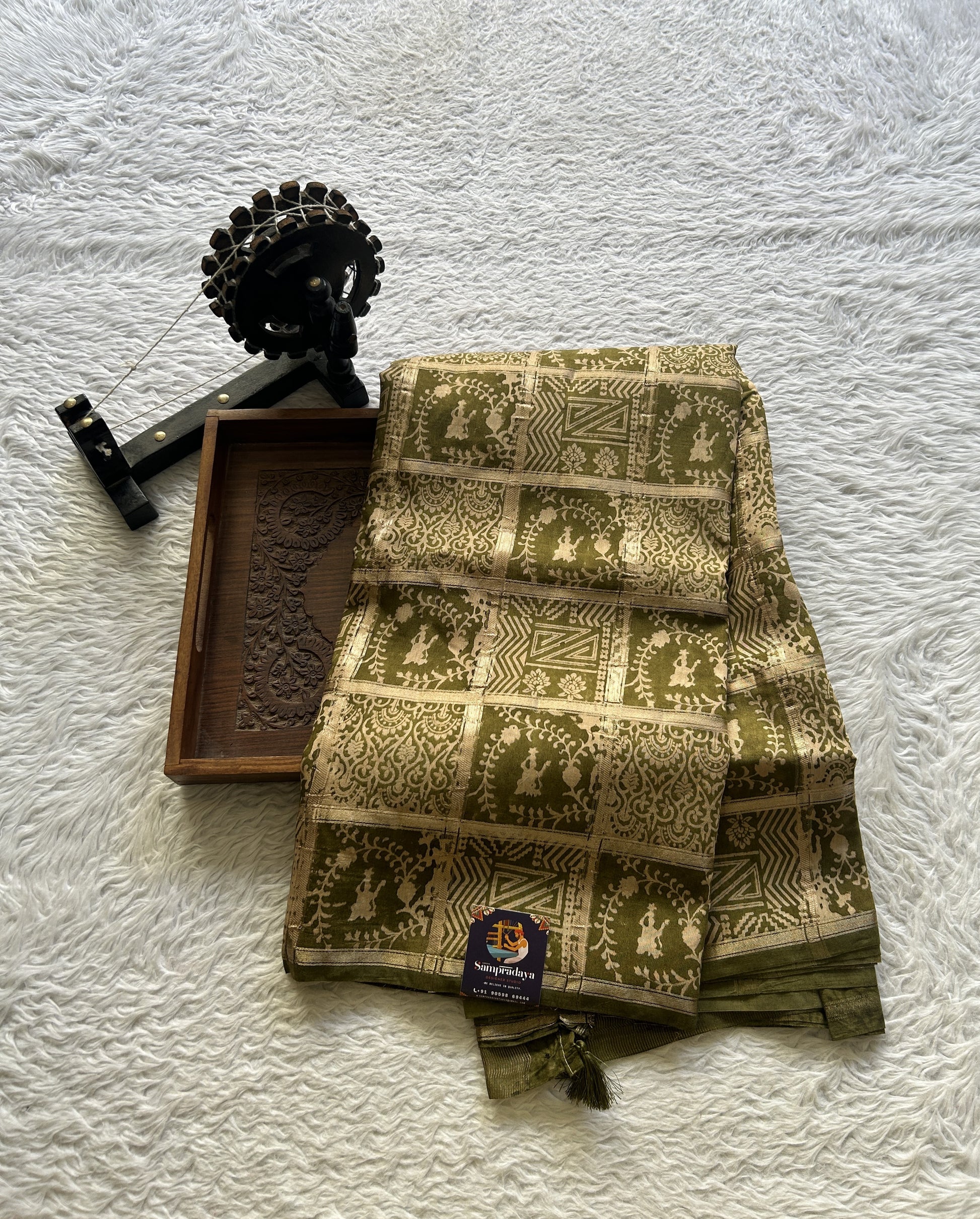 Dola Crepe Saree Olive Green Colored Elegantly Paired with a Zari Border. - Sampradaya Designer Studio